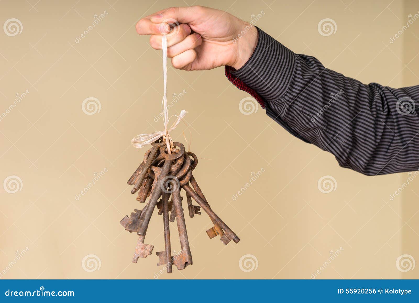 Male Hand Holding String of Antique Rusty Keys Stock Photo Image of