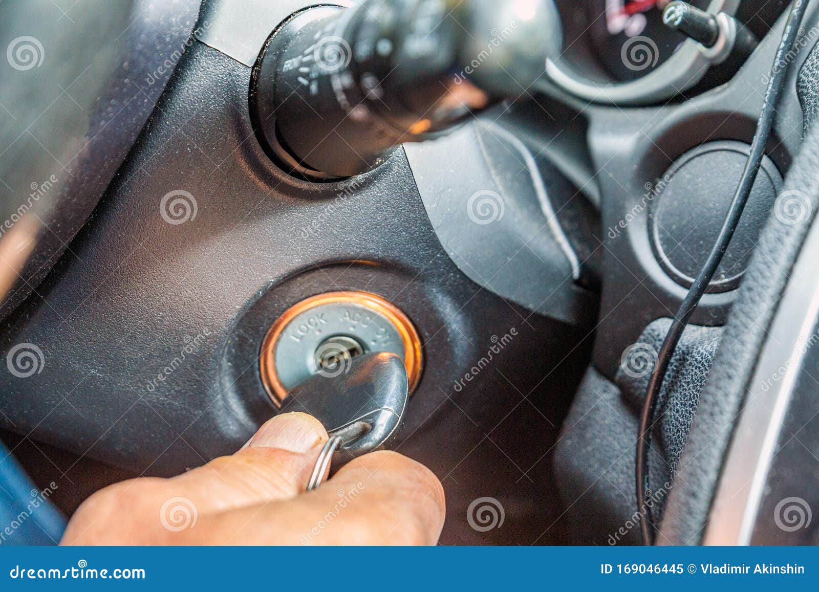 A Male Hand Inserts a Key into the Ignition Switch Stock Image Image