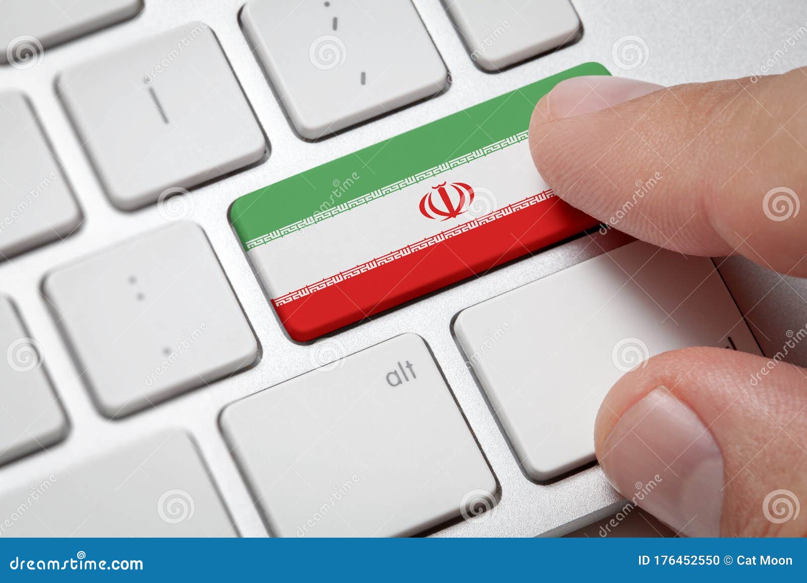 male hand pressing keyboard key.iran flag button