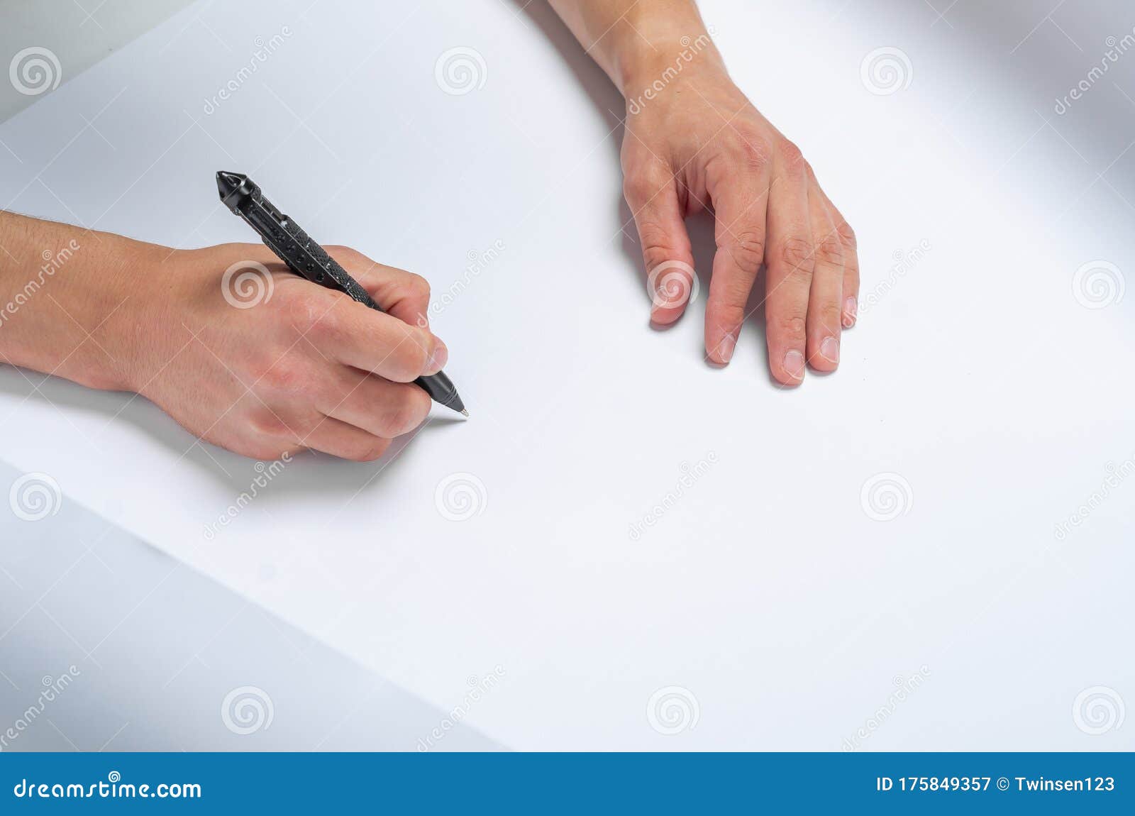 Male Hand Writes a Black Pen on White Paper Stock Image - Image of male ...