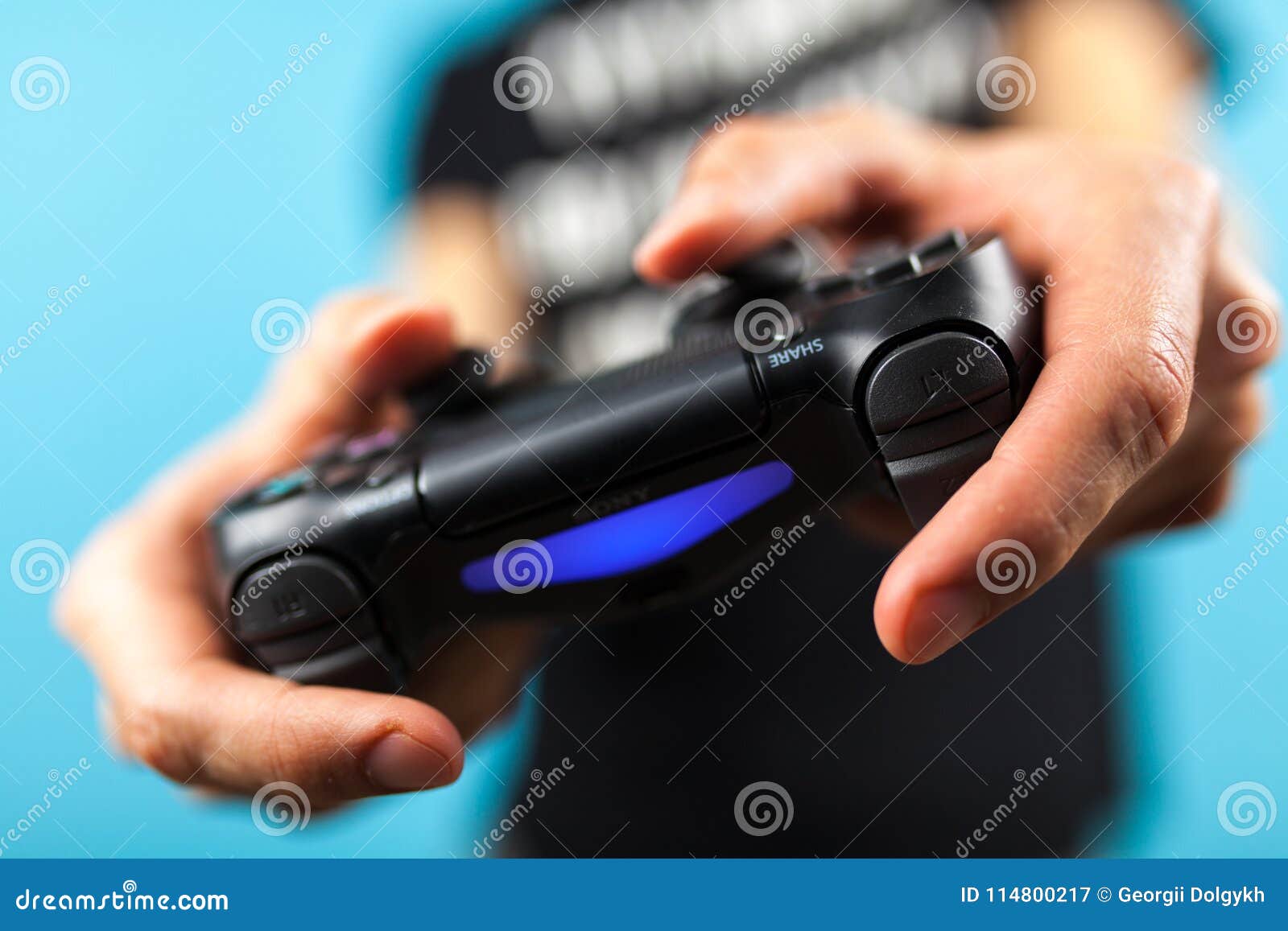 Male Hands Holding a PS4 Controller Editorial Photography Image of