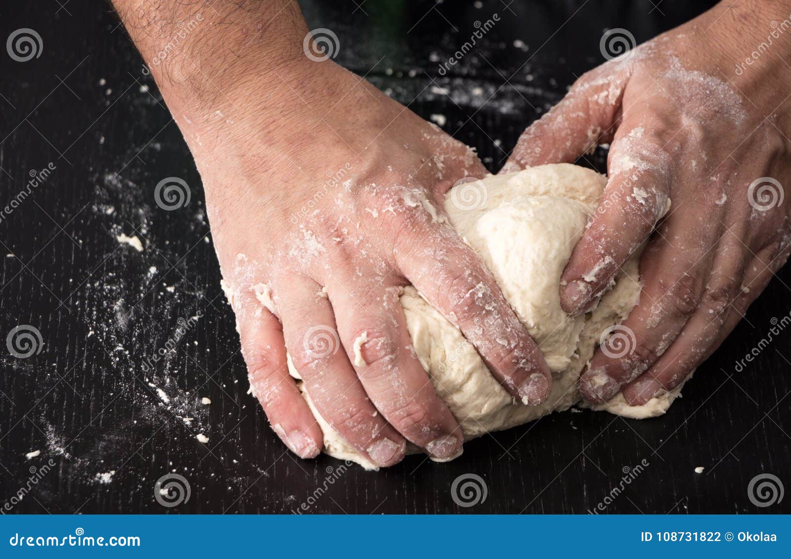 Male Hands Kneading Dough, Baking Preparation Closeup. Stock Photo