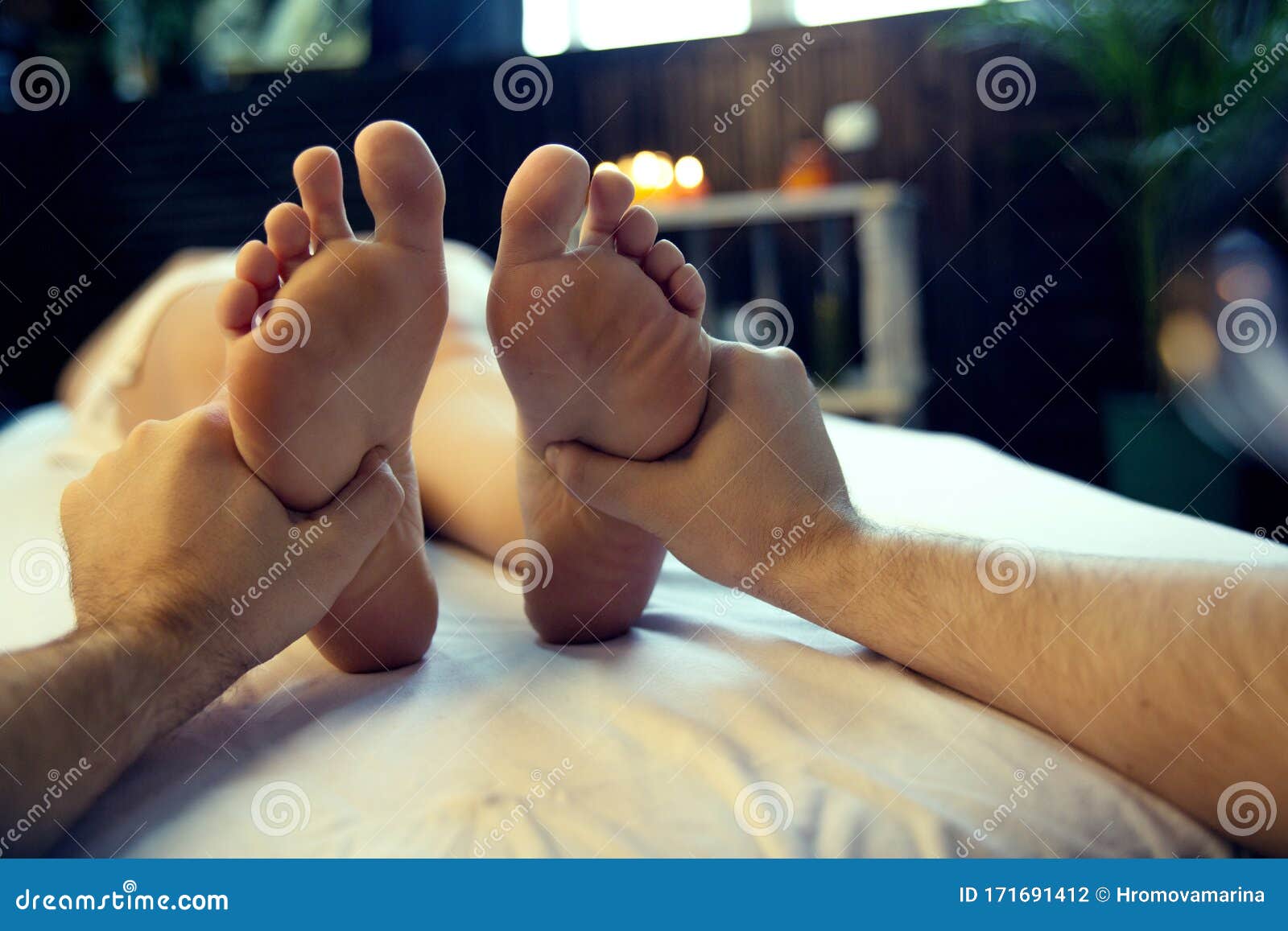 Male Hands Of A Massage Therapist Do A Woman Foot Massage Stock P