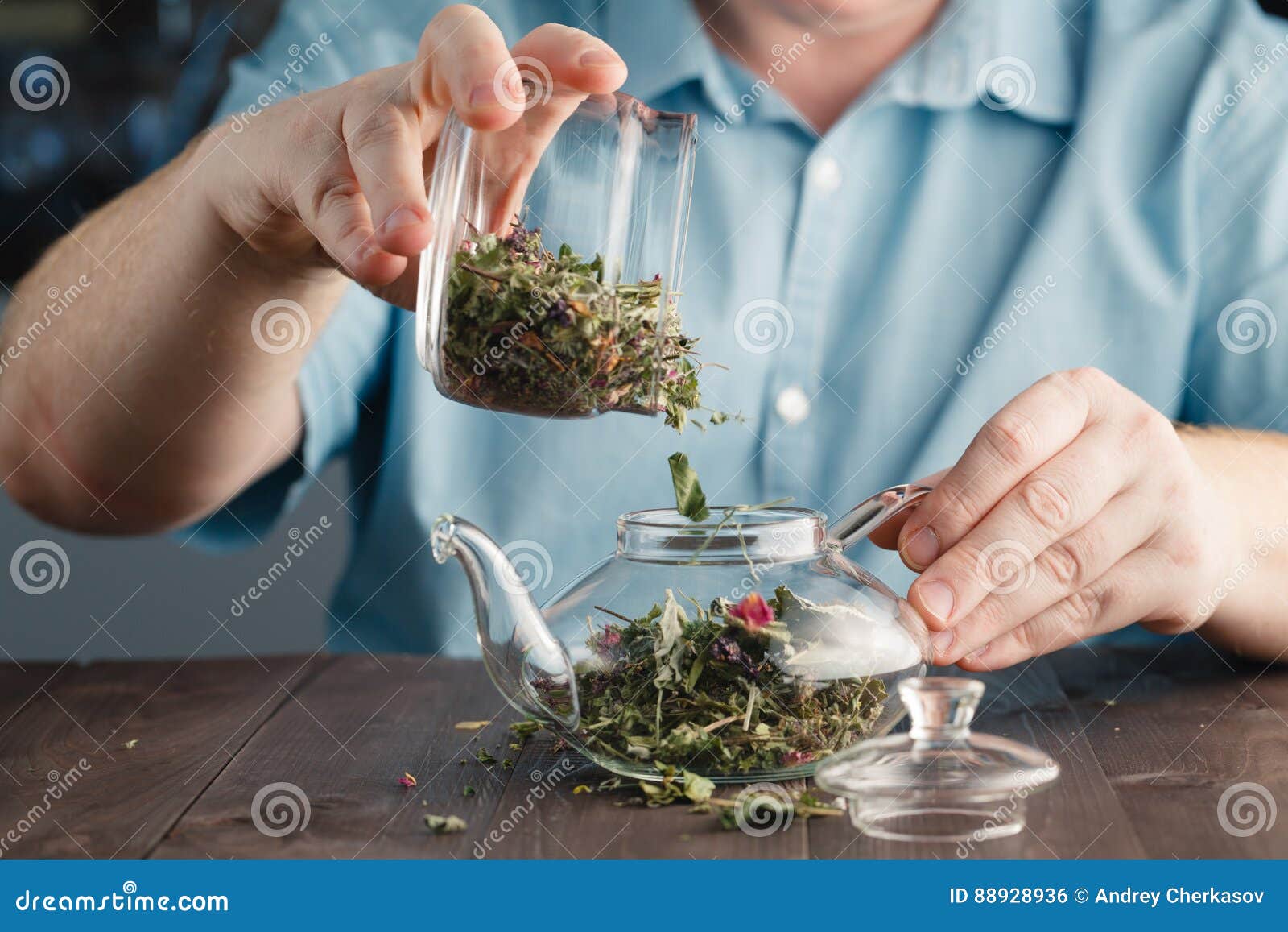 Male Hands Puts Herbal Tea in the Kettle Stock Photo Image of essential, herbal 88928936