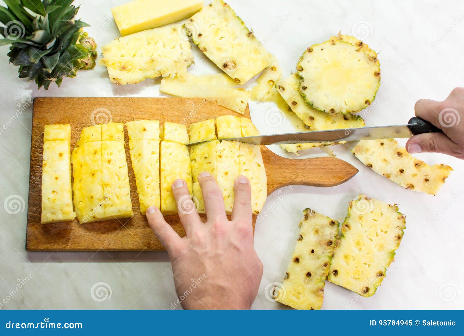 Male Hands Slicing Pineapple Fruit on a Board Stock Image Image of