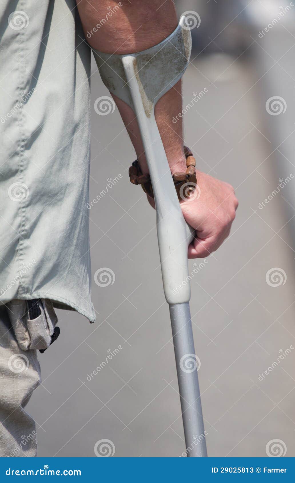 Male holding a crutch stock image. Image of fracture 29025813