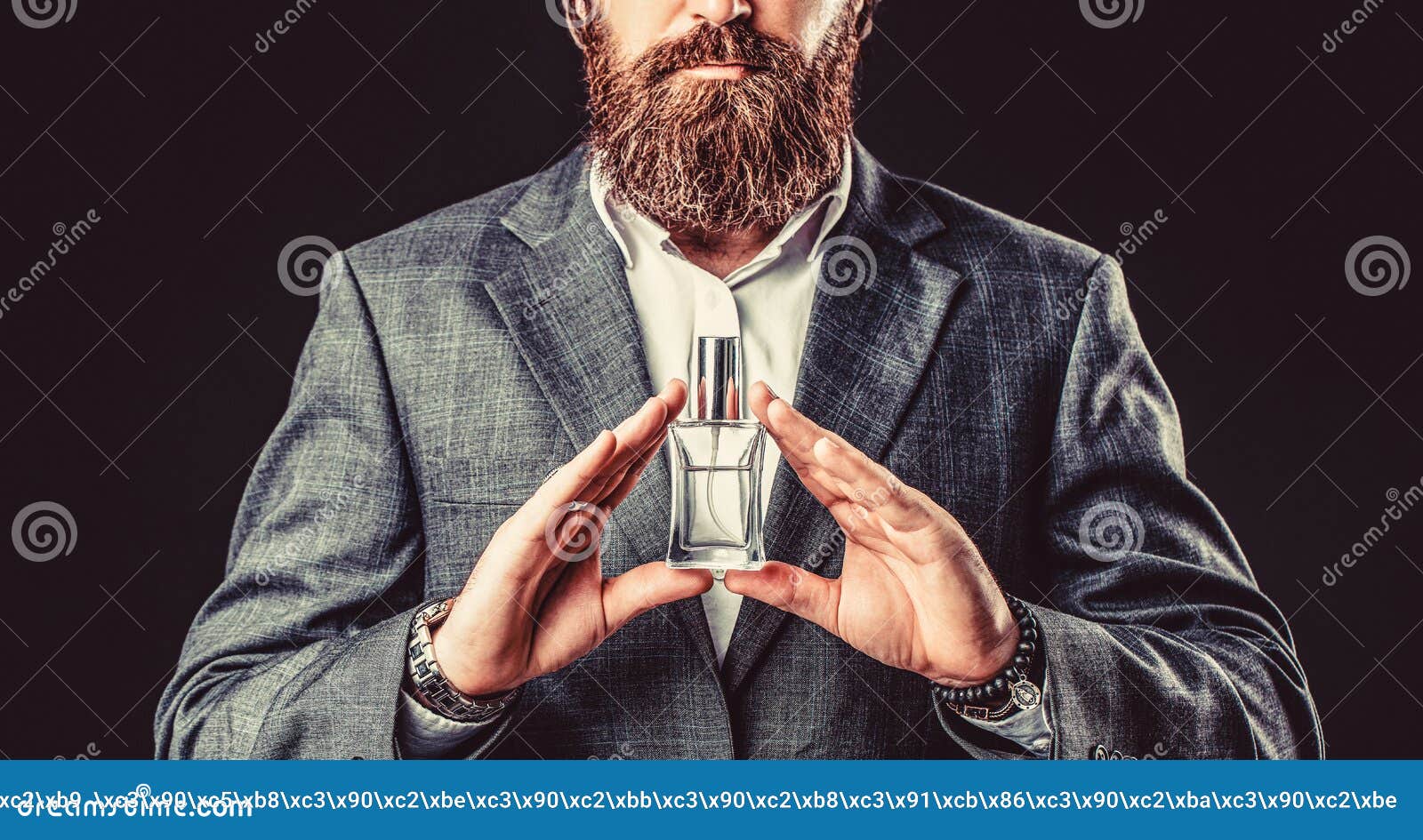 Male Holding Up Bottle of Perfume. Man Perfume, Fragrance. Perfume