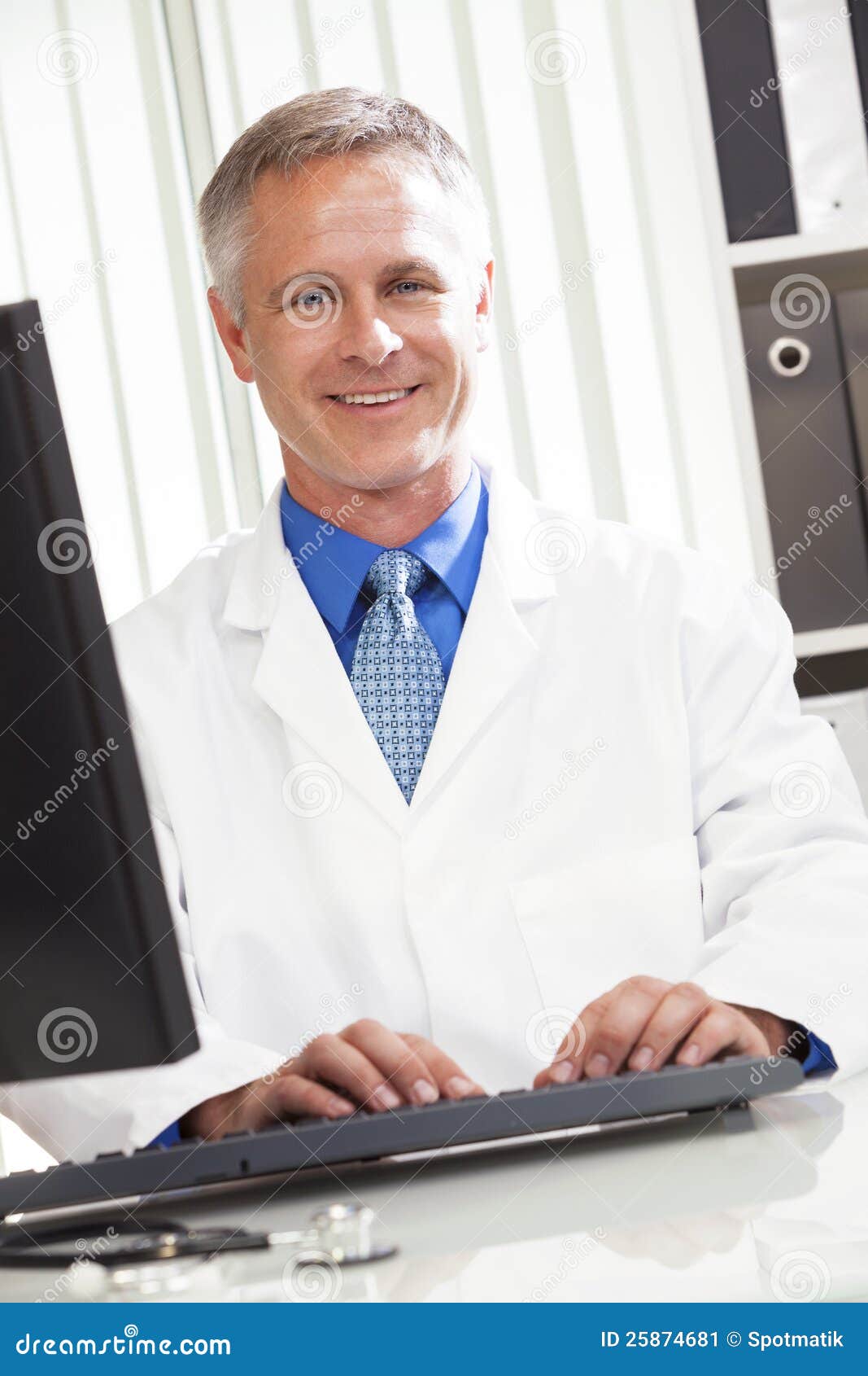 Male Hospital Doctor Using Computer Stock Image - Image of physician ...