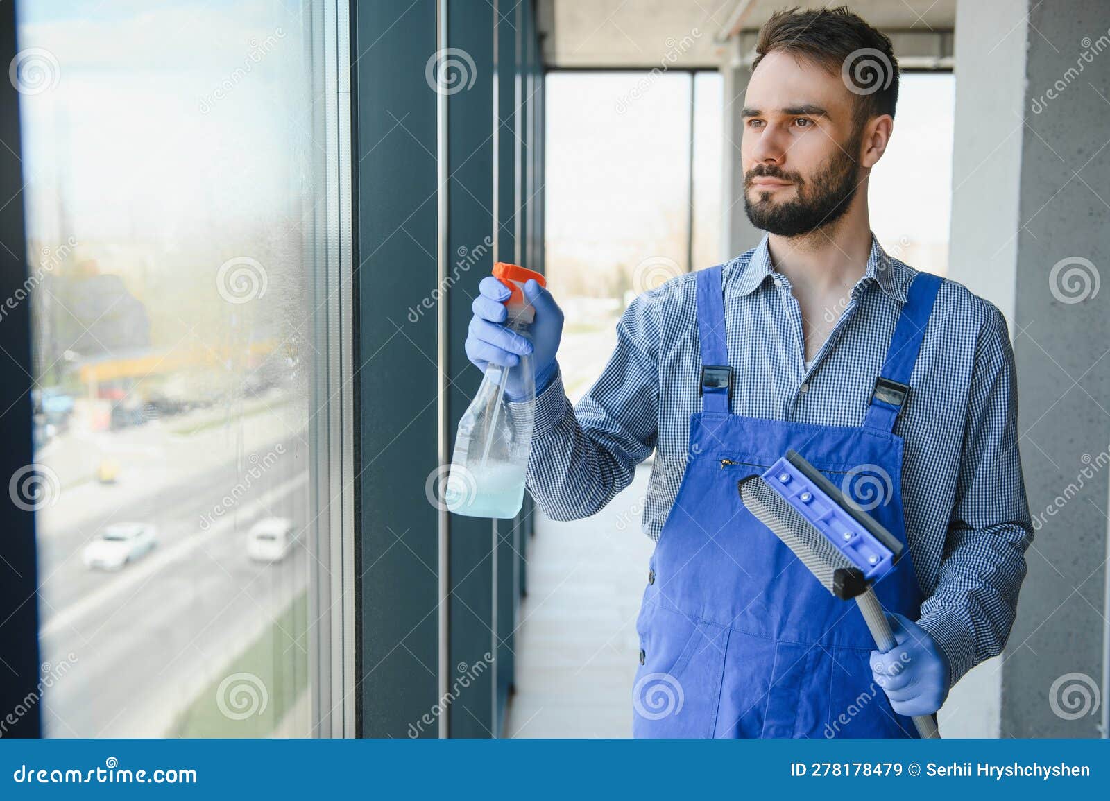 Male Janitor Cleaning Window in Office Stock Image Image of person