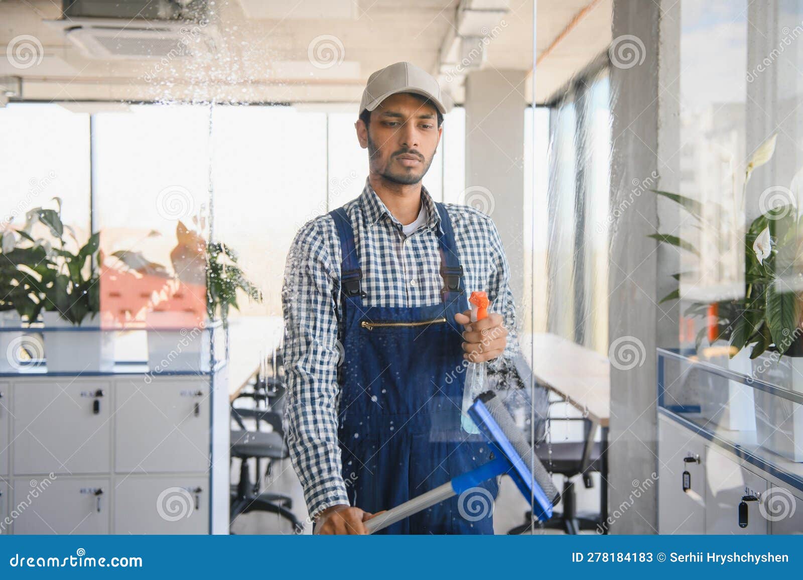 Male Janitor Cleaning Window in Office Stock Image Image of hygiene