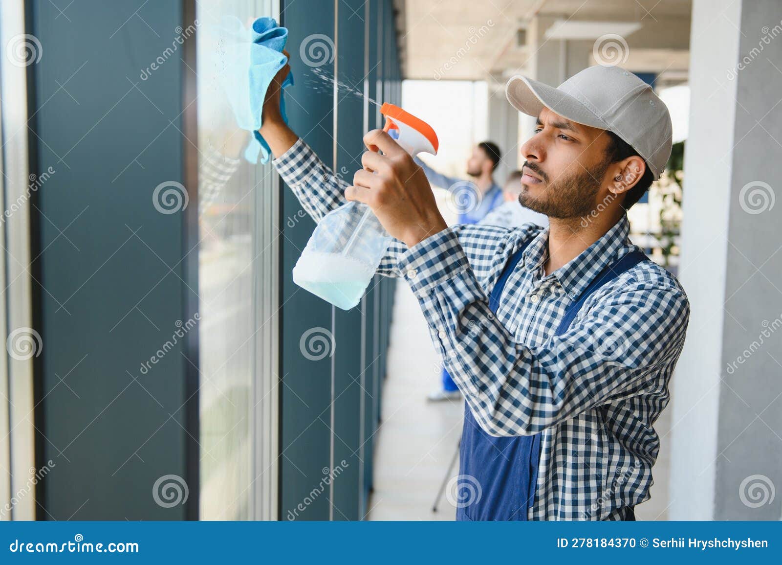 Male Janitor Cleaning Window in Office Stock Photo Image of clear