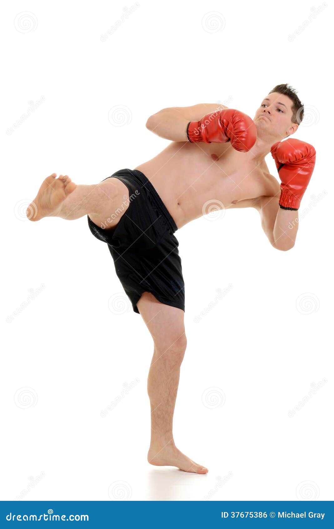 Male kick boxer kicking stock photo. Image of kick, conflict 37675386