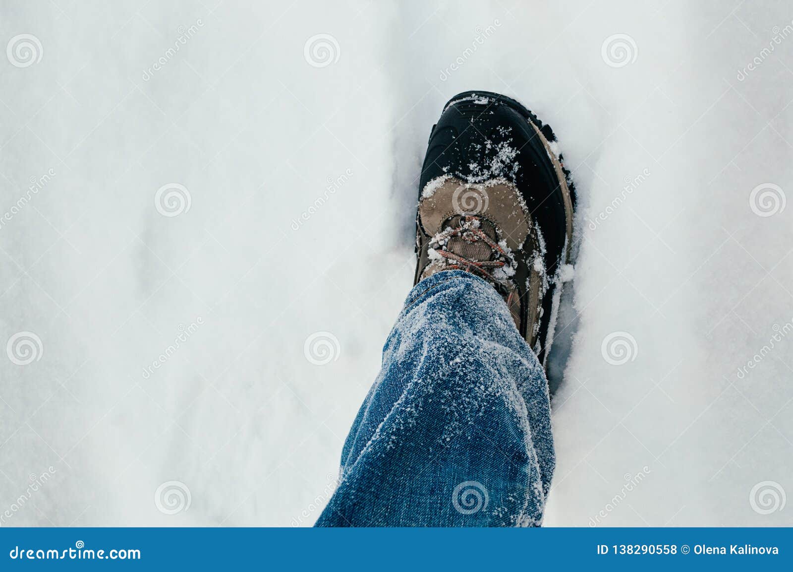 Male leg walking in snow stock photo. Image of snow - 138290558