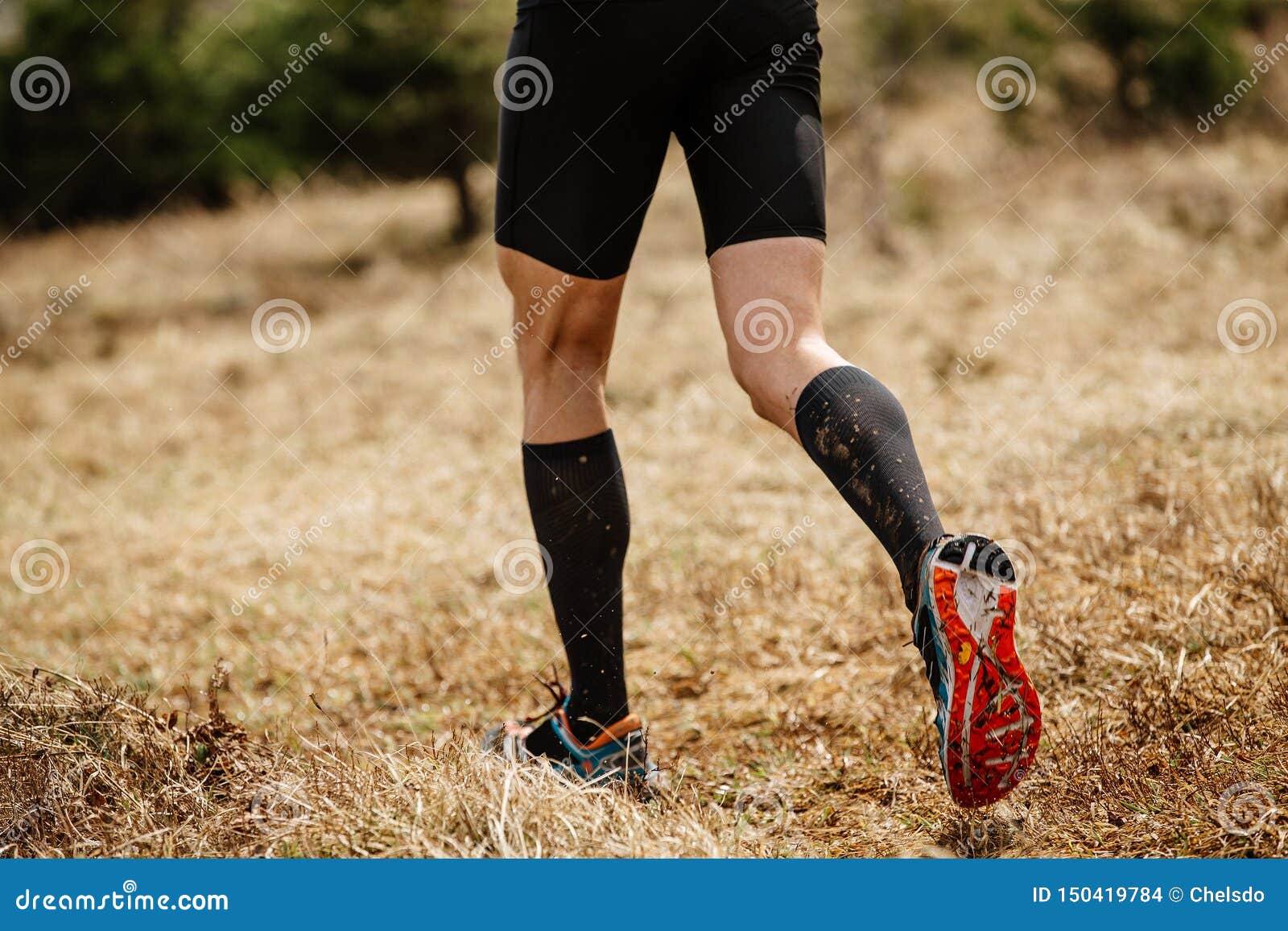 Male Legs Runner in Black Compression Socks Stock Photo - Image of ...