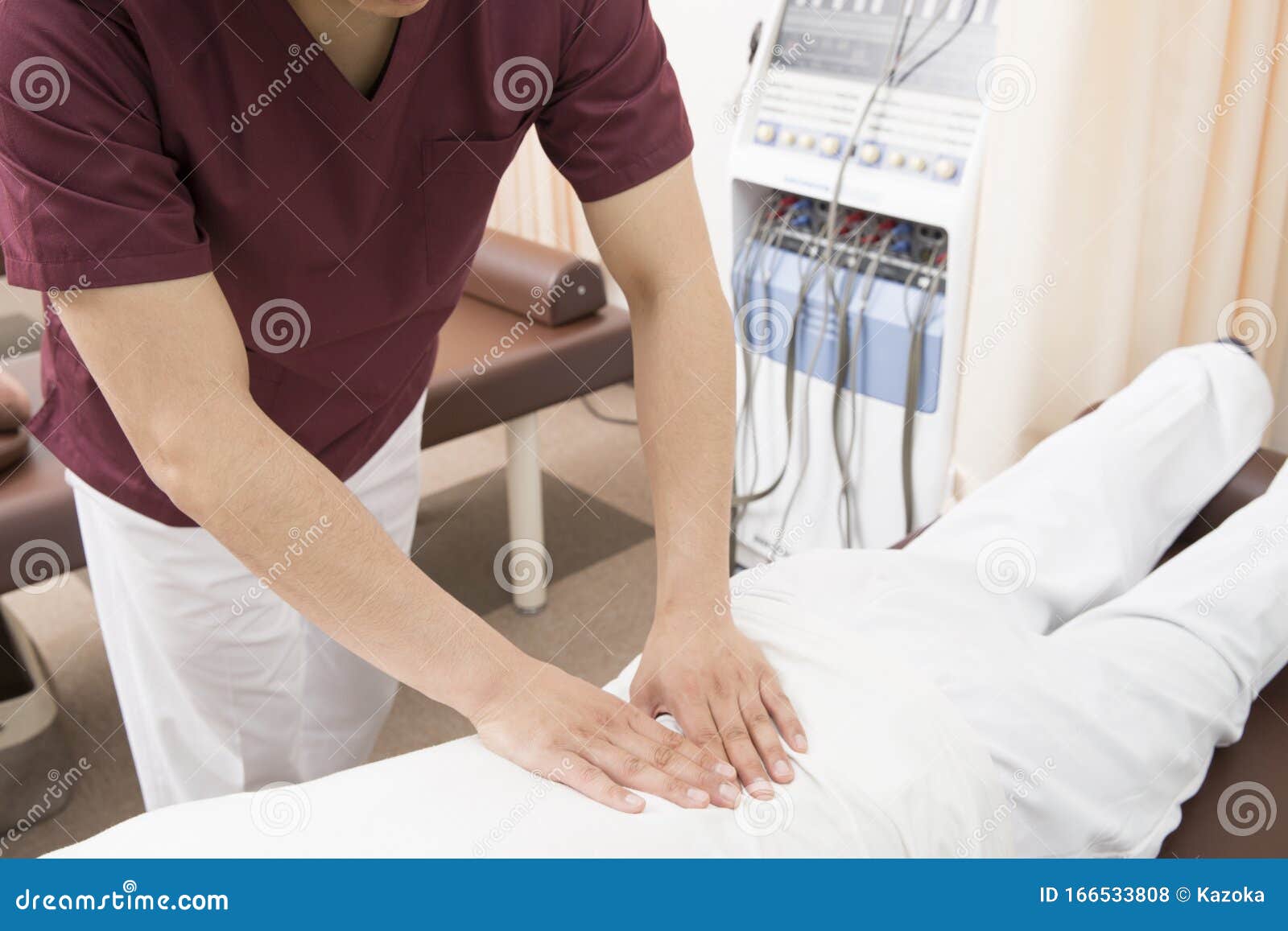 A Manipulator Performs a Treatment Stock Photo Image of legs