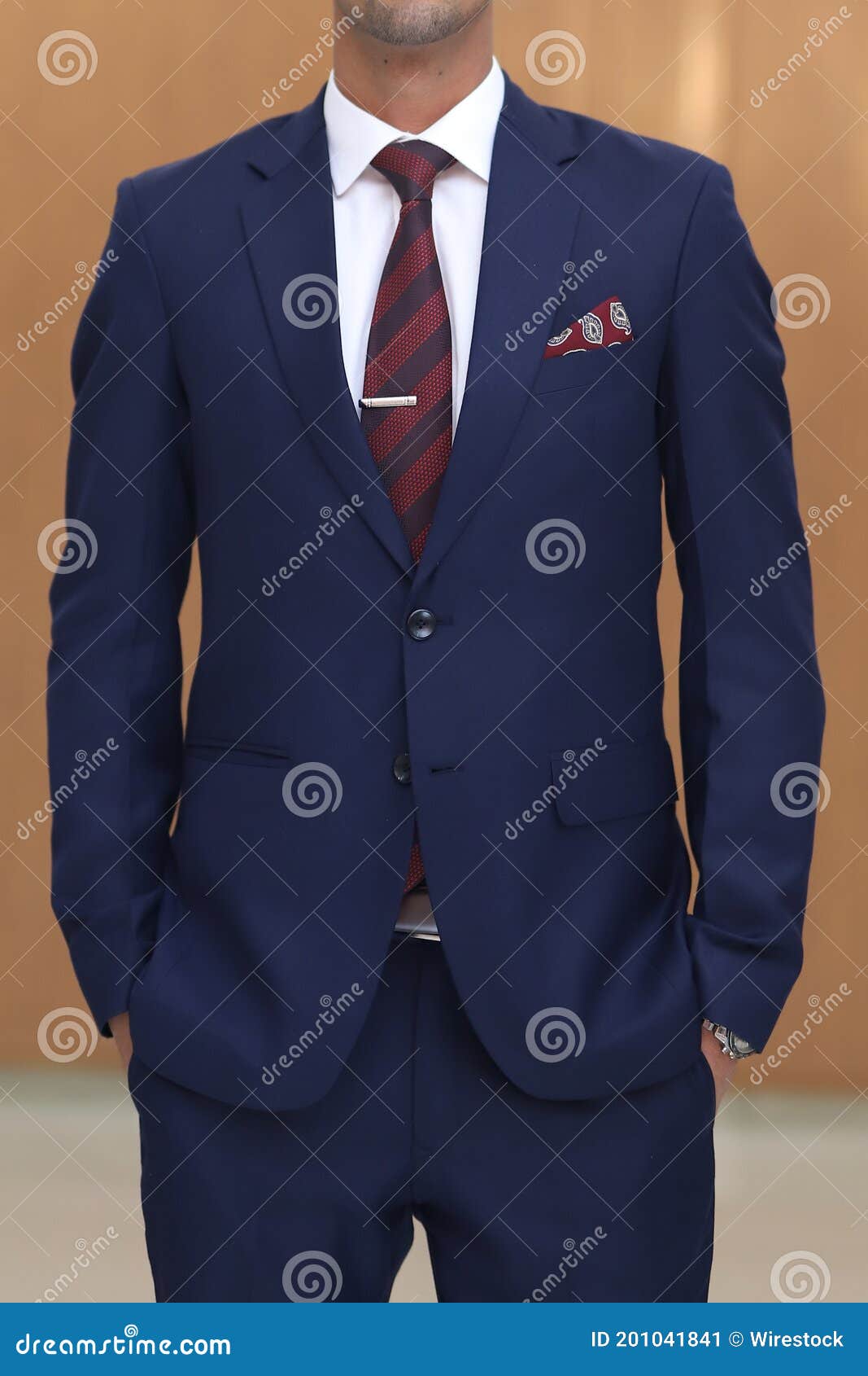Male with a Navy Blue Suit White Shirt Red Maroon Striped Tie and ...