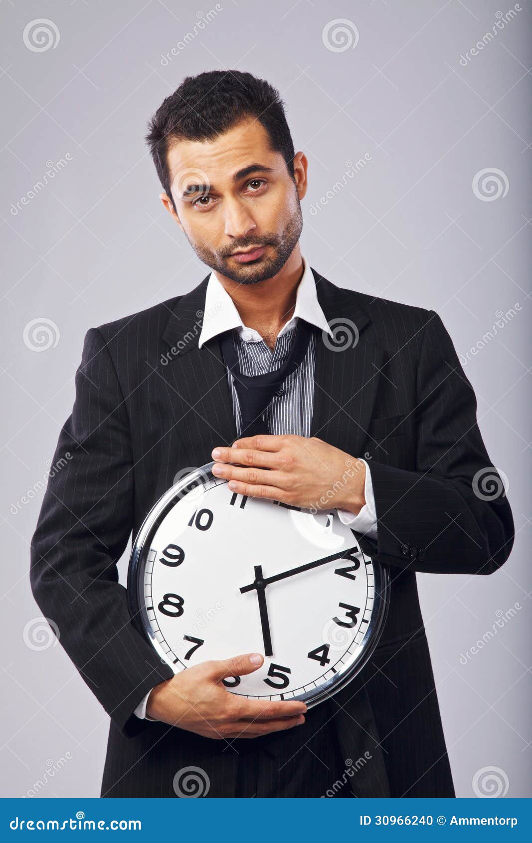 Office Worker With A Wall Clock Office Worker With A Wall Clock Stock Photo Image