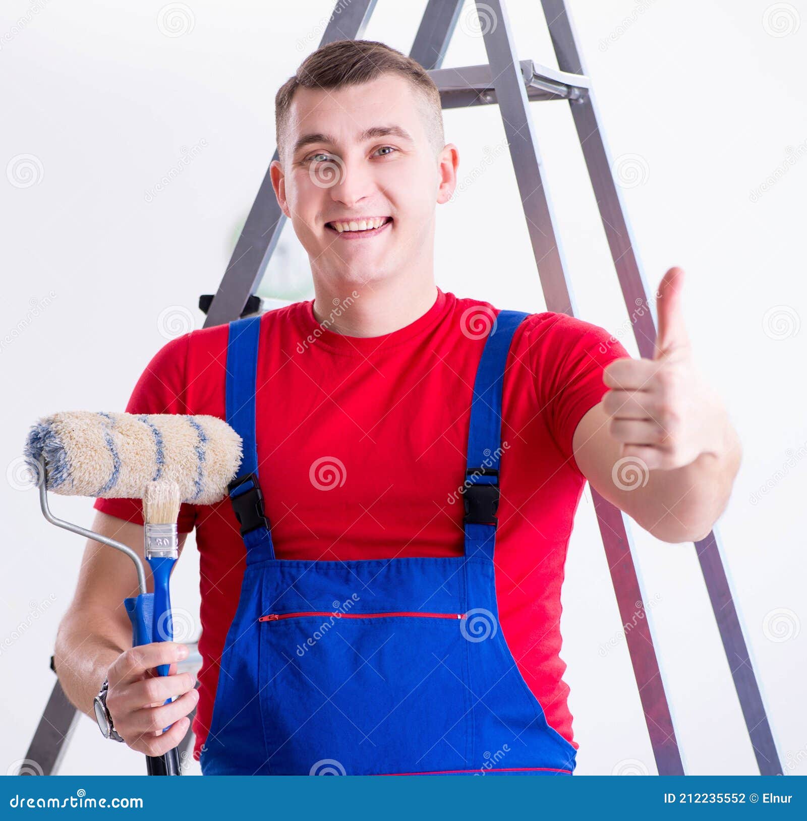 Male Painter Preparing for Painting Job at Construction Site Stock