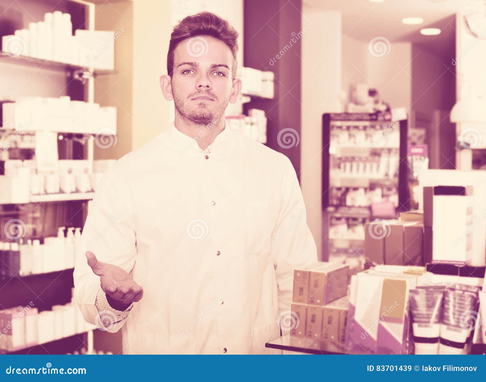 Male Pharmacist Wearing White Coat Standing in Drug Store Stock Image ...