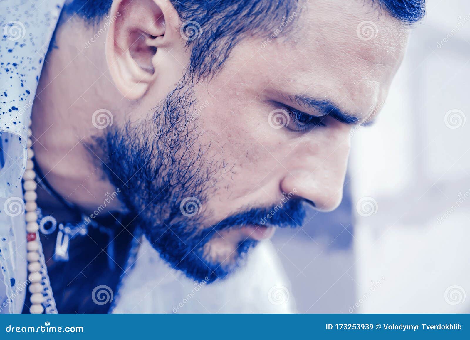 male portrait in sadness. mans fashions. handsome man closeup portrait. stylish latin man. handsome guy sad and strong.