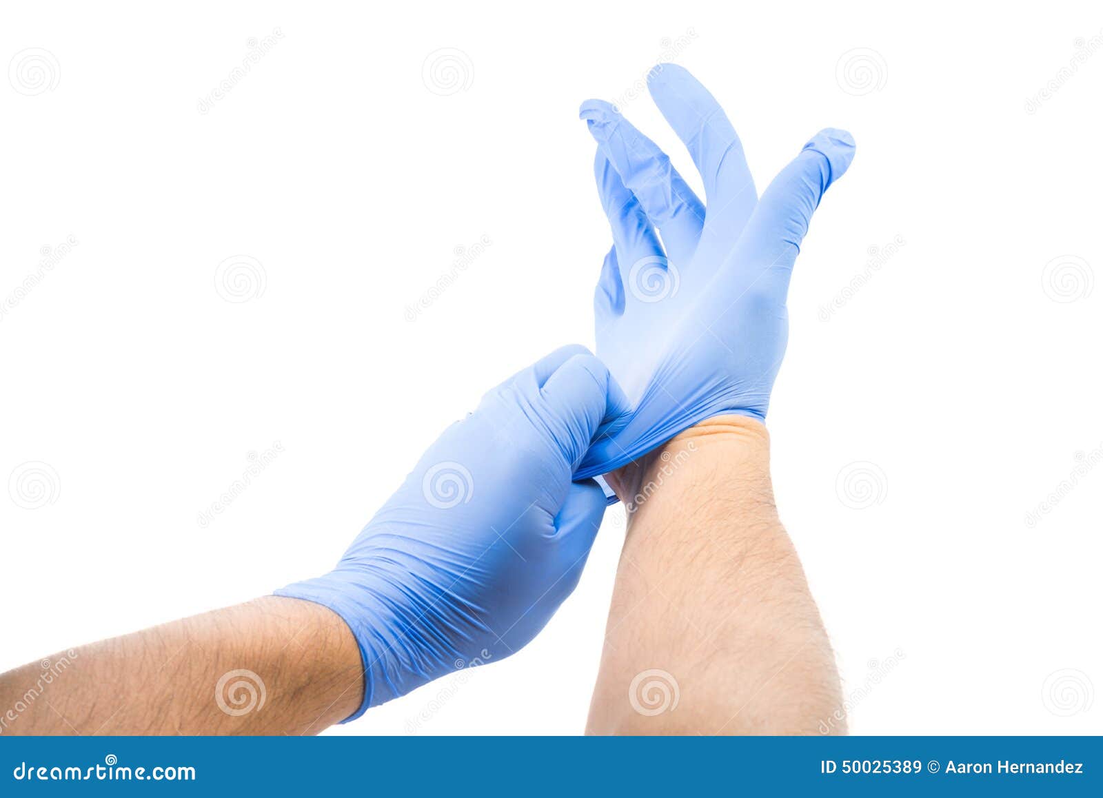 male putting on latex gloves
