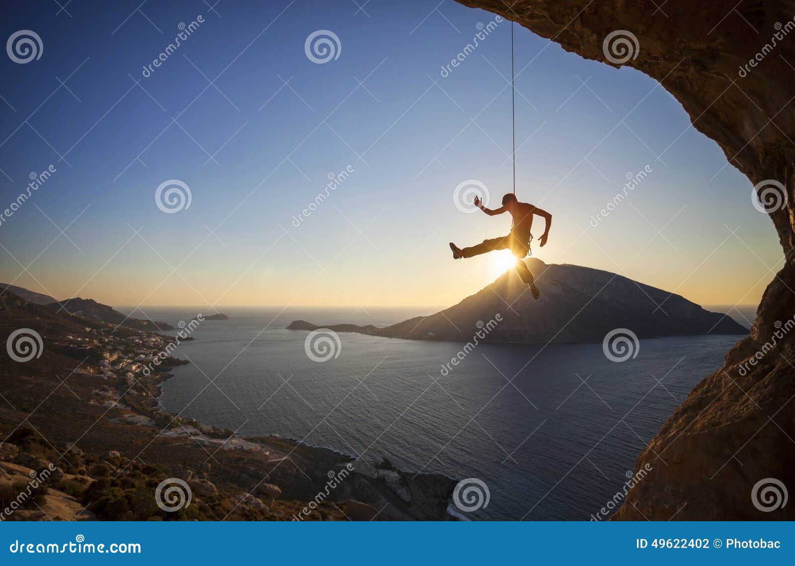 Male Rock Climber Falling of a Cliff at Sunset Stock Photo Image of