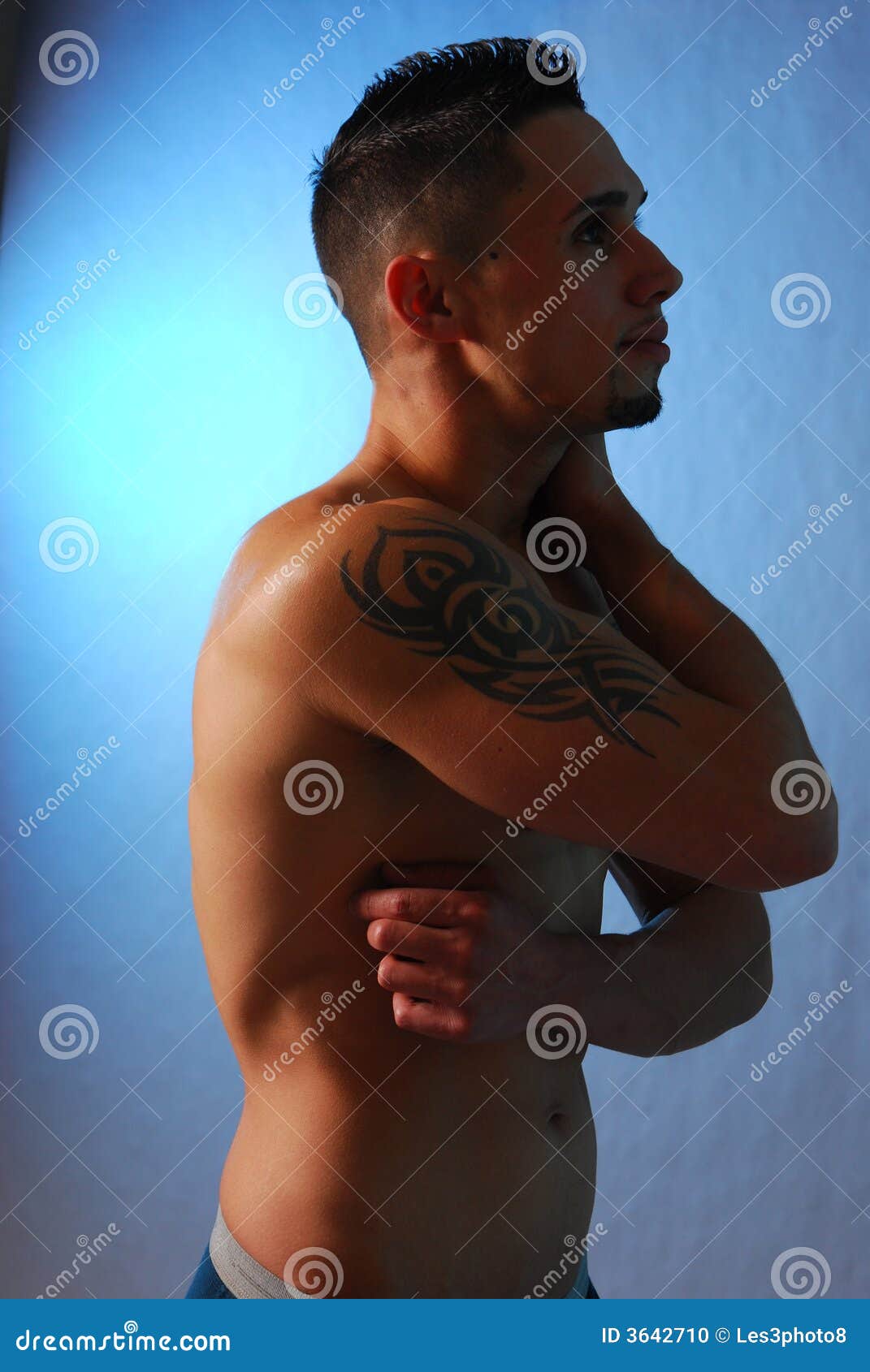 Male with Shoulder Tattoo Blue Stock Photo - Image of blue, stare: 3642710