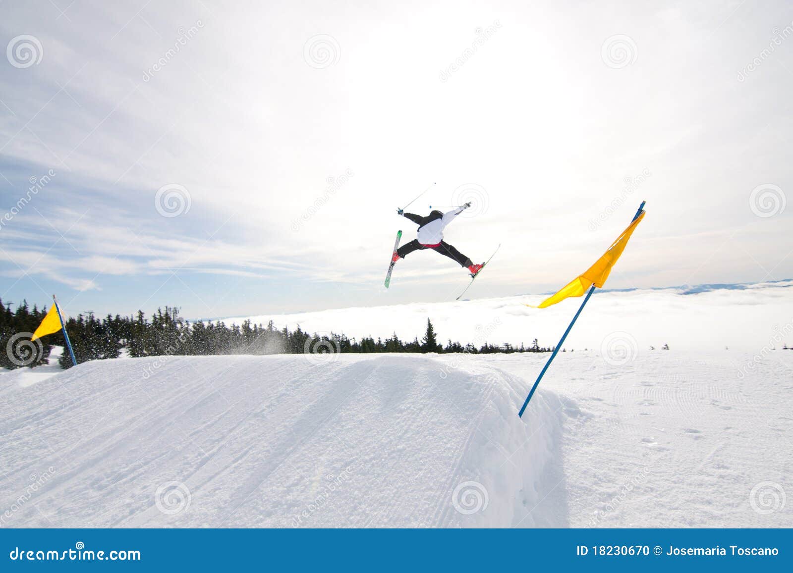 male skier catches big air.
