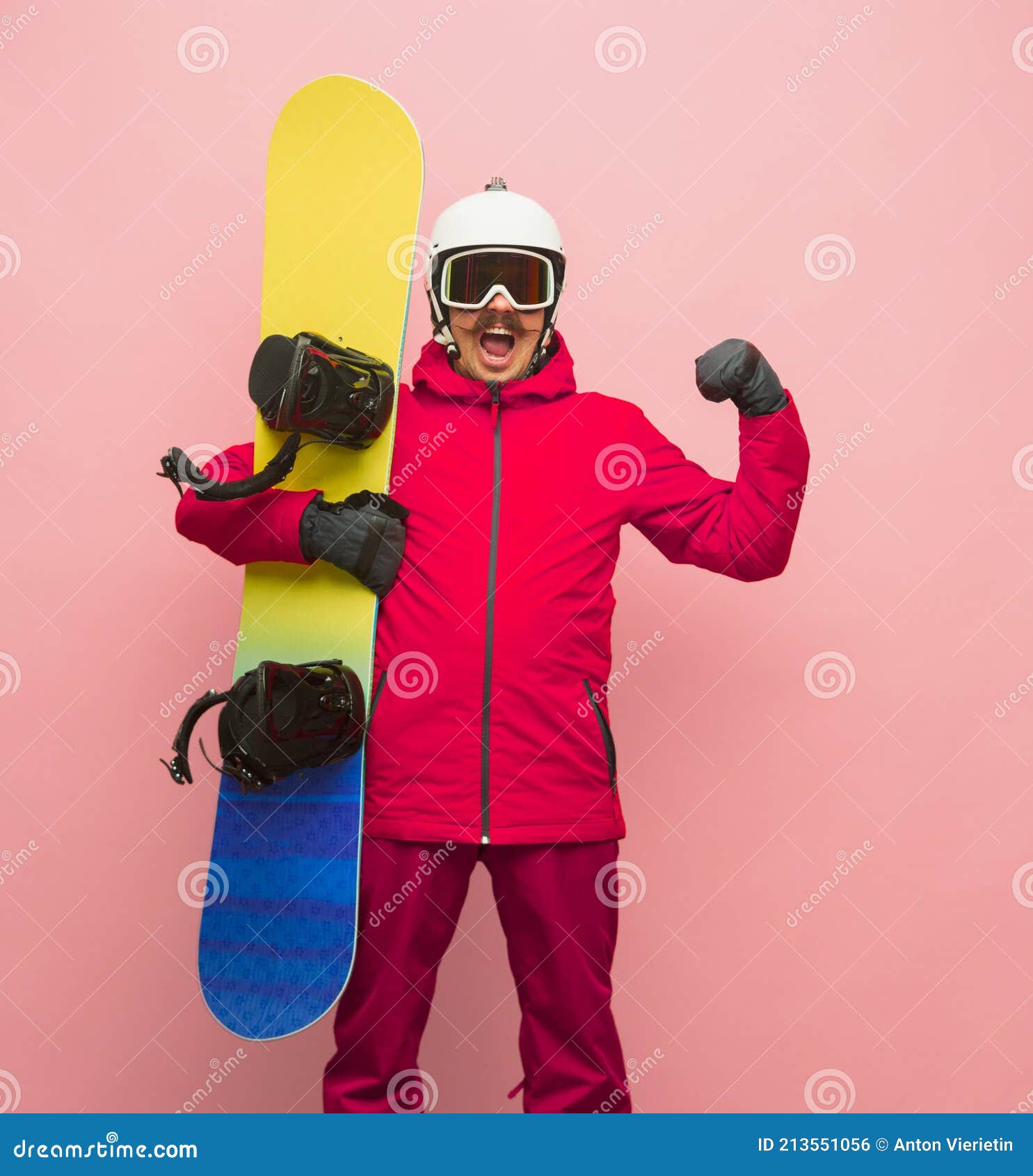 Male Snowboarder with Skiing Gear in Bright Ski Suit Isolated on