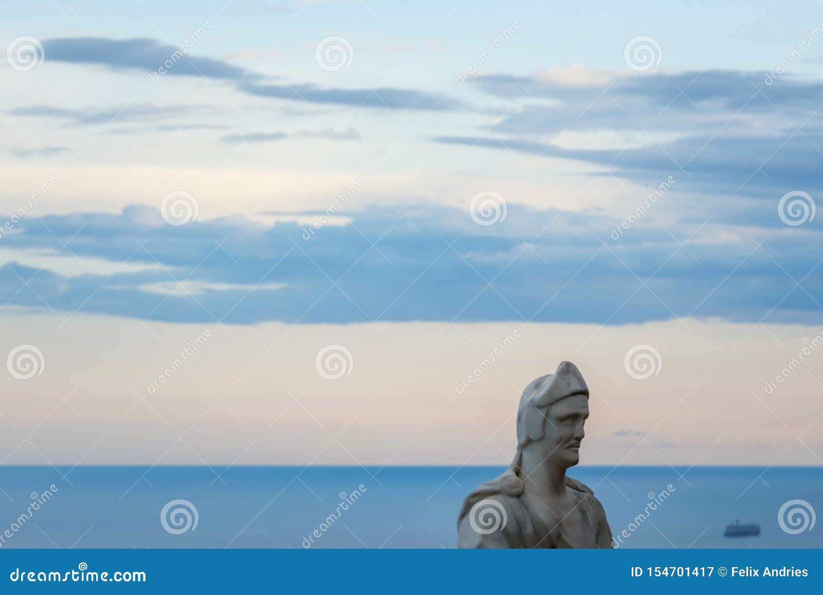 male statue from the belvedere, the so-called terrazza dell`infinito, the terrace of infinity seen on the sunset, villa cimbrone,