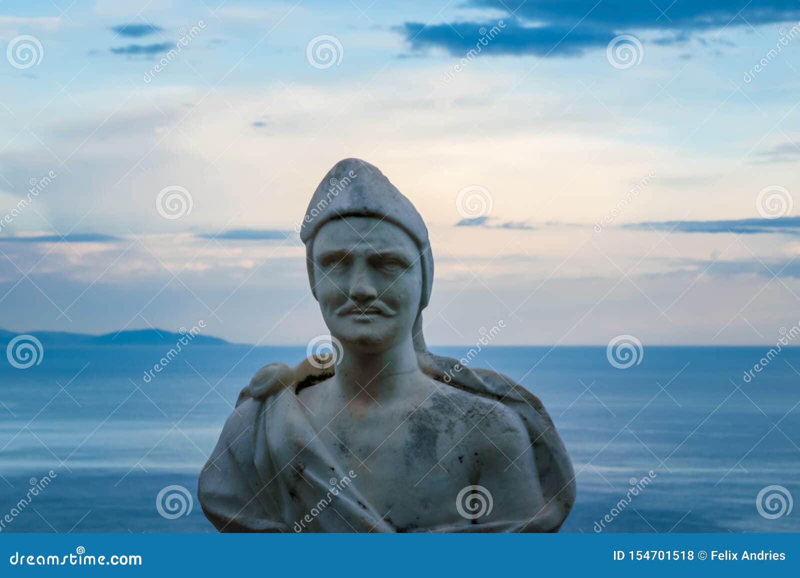 male statue from the belvedere, the so-called terrazza dell`infinito, the terrace of infinity seen on the sunset, villa cimbrone,