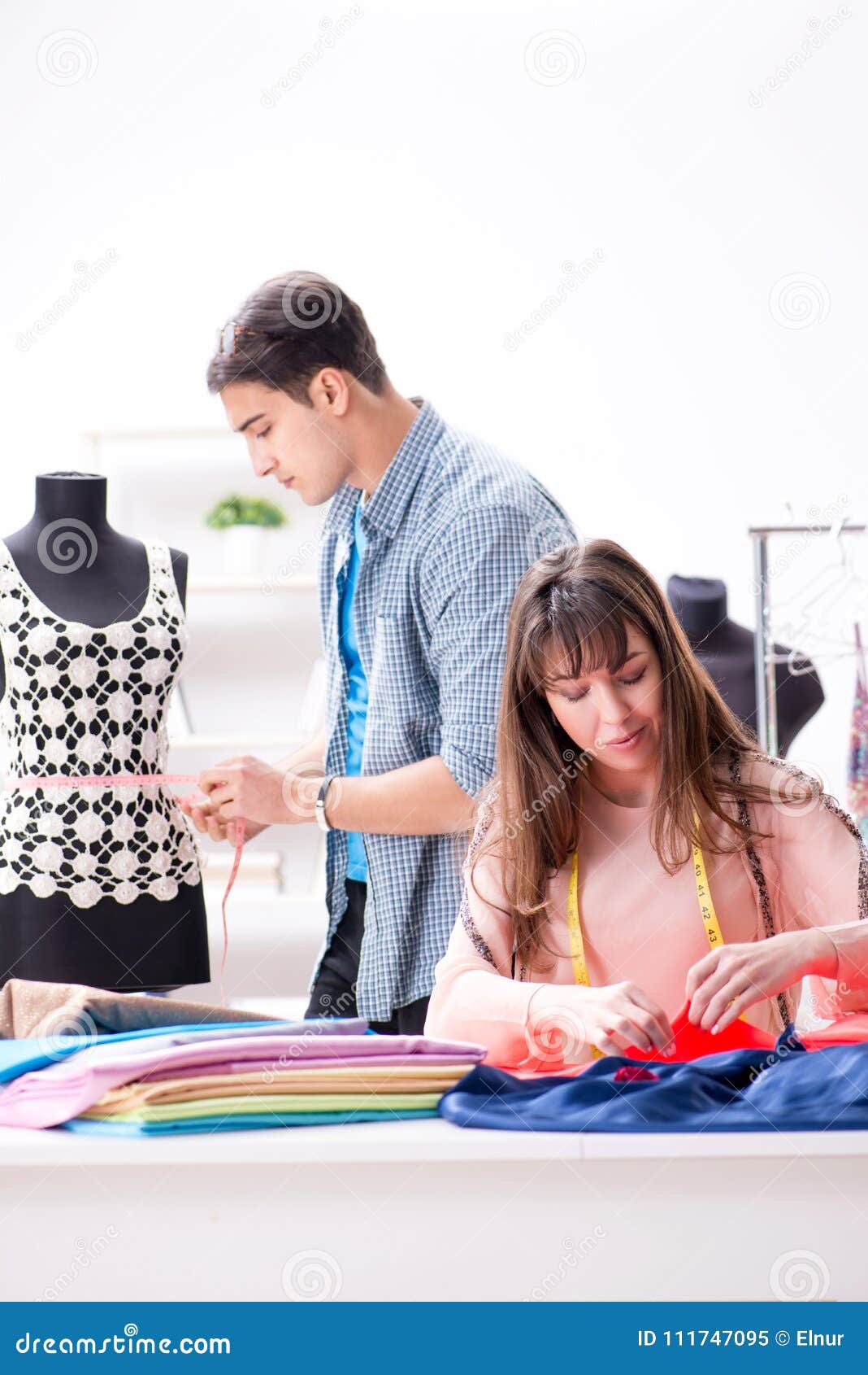 The Male Tailor with Female Student in Workshop Stock Image - Image of ...