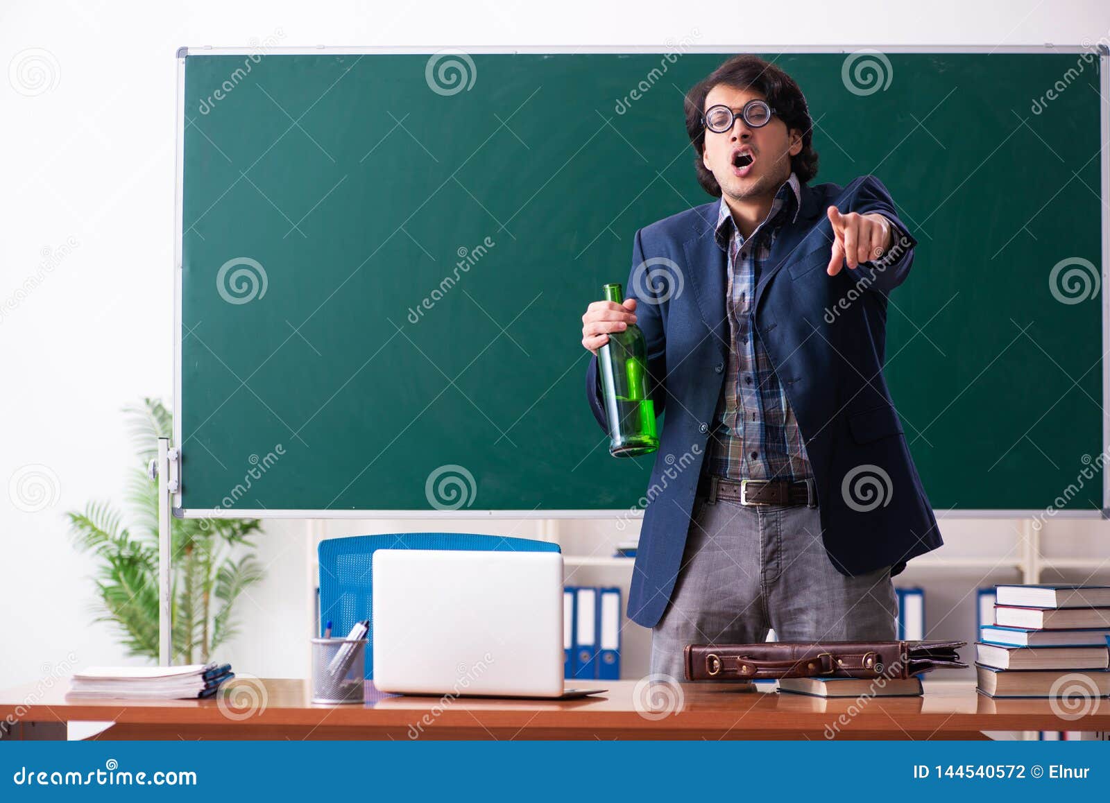 The Male Teacher Drinking in the Classroom Stock Photo Image of class