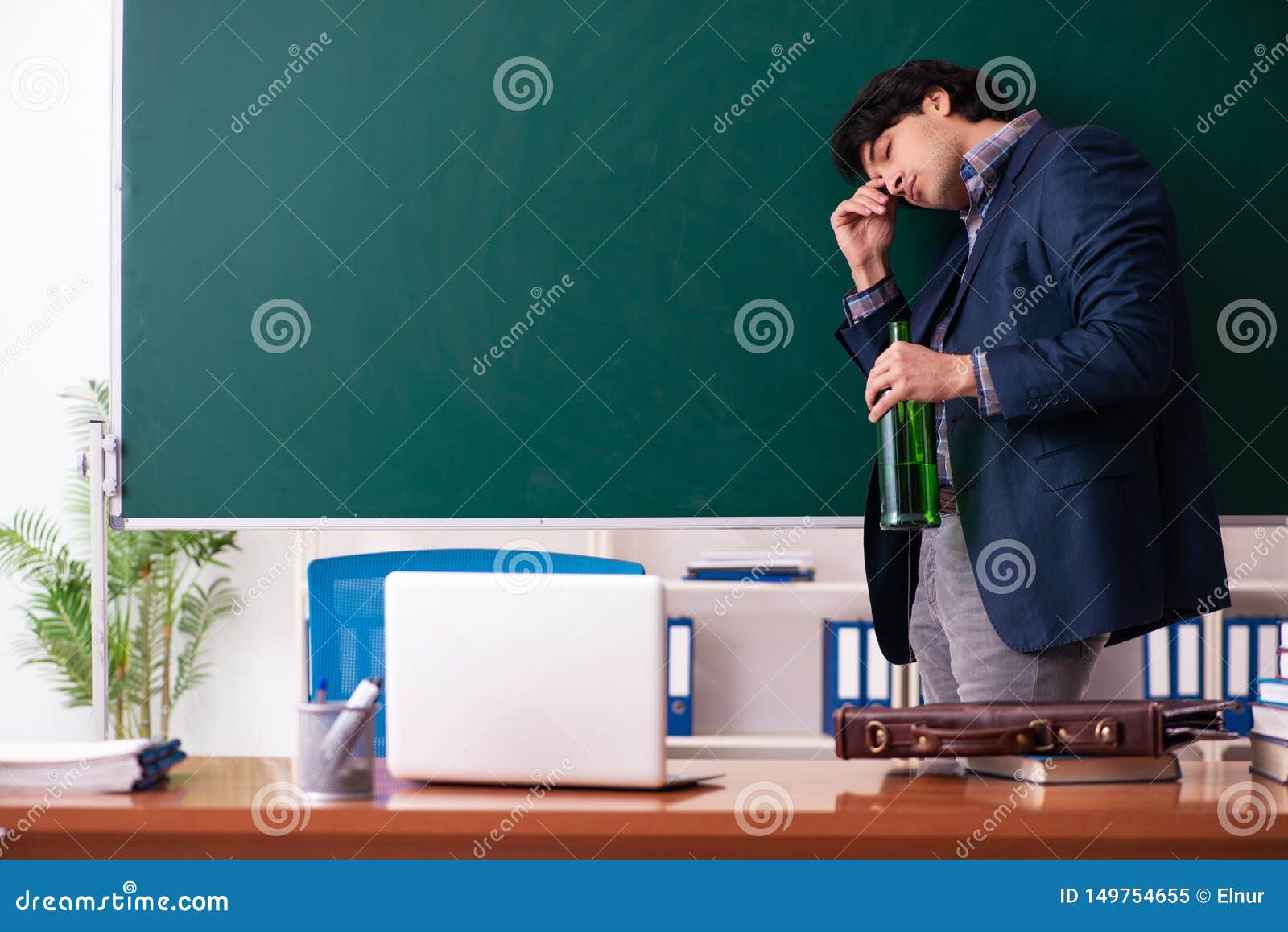 Male Teacher Drinking in the Classroom Stock Image Image of class