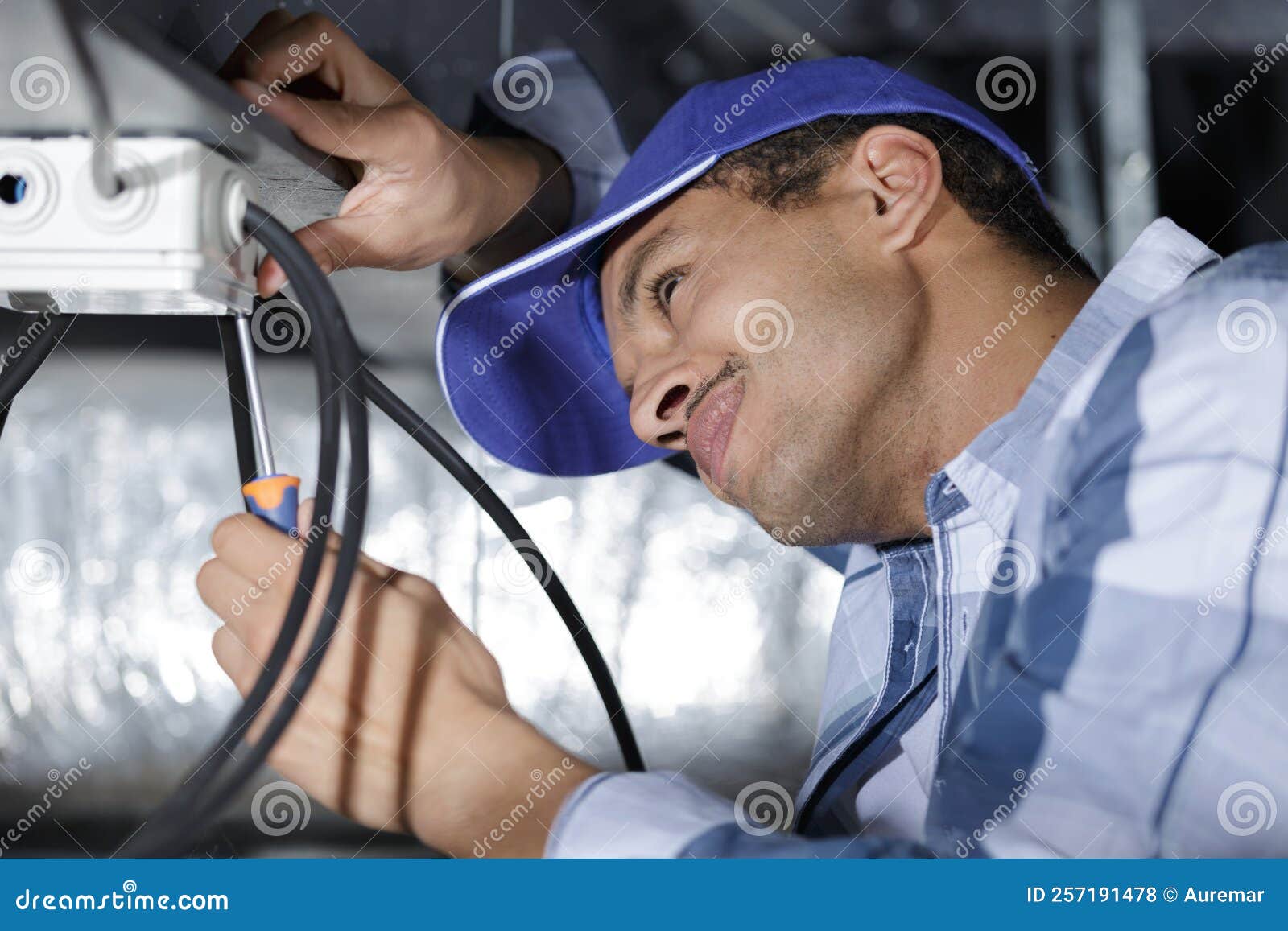 Male Technician Fixing Cables Stock Photo Image of appartment