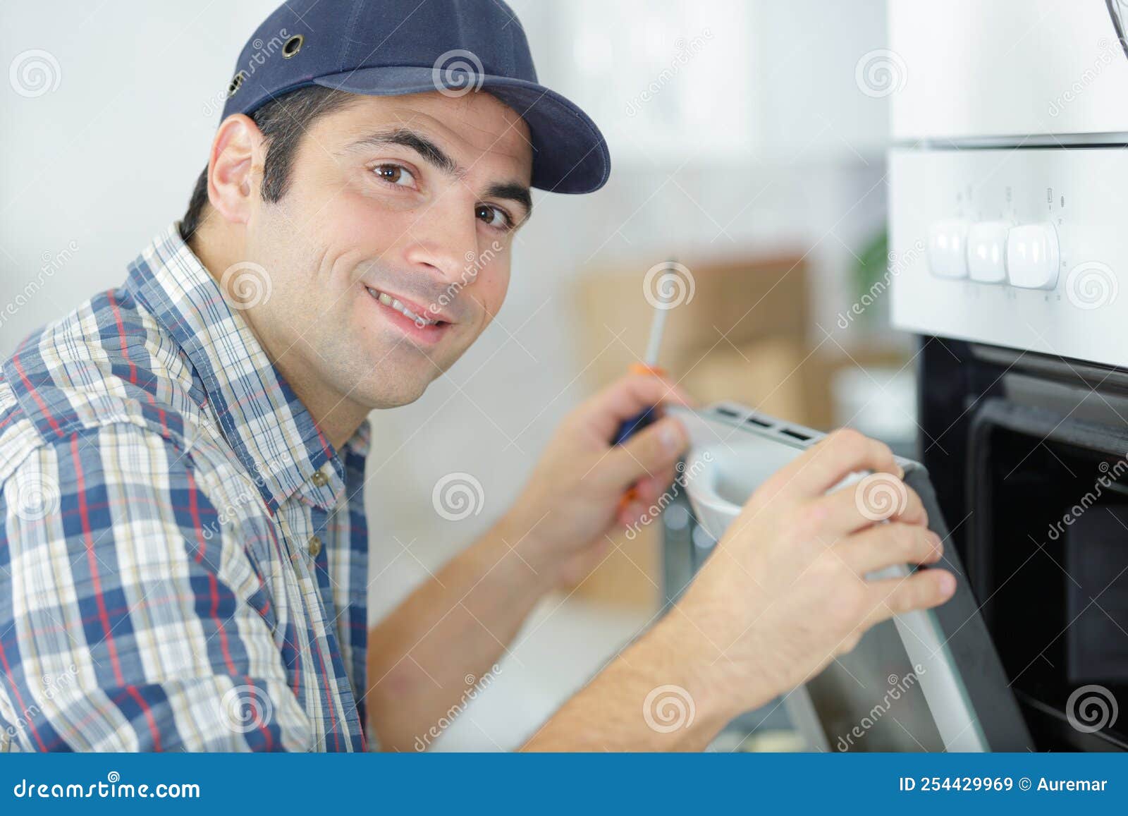 Male Technician Installing Electric Oven Stock Image Image of