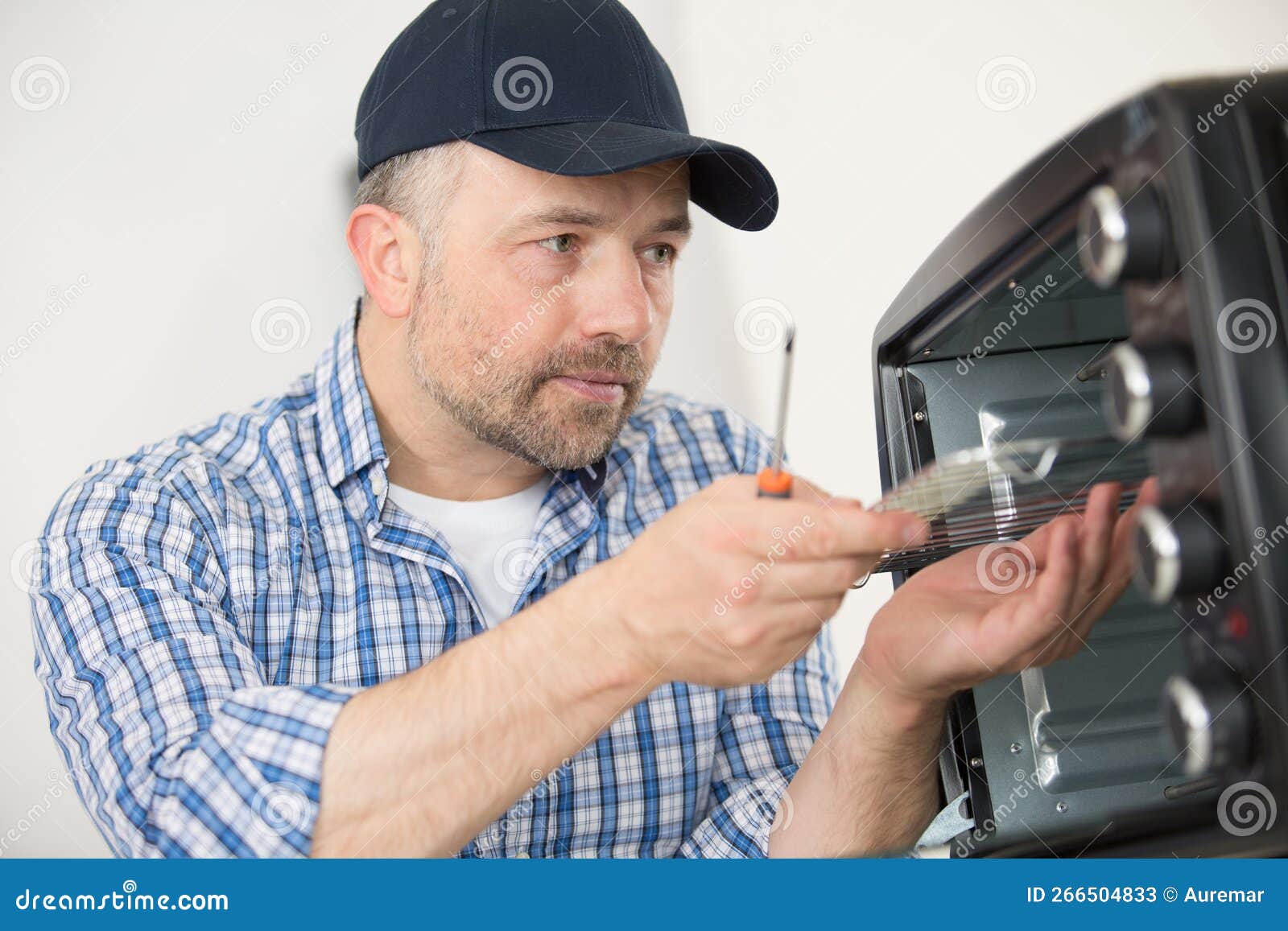 Male Technician Repairing Microwave Oven Stock Image Image of adult
