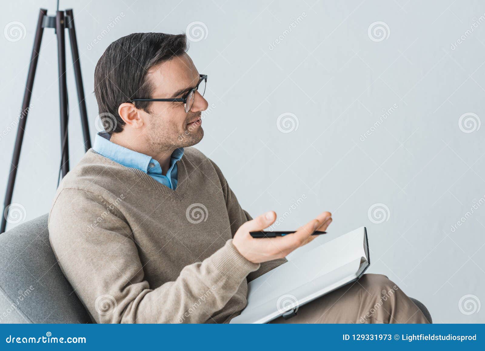 Male Therapist In Glasses Listening To Patient Stock Image Image