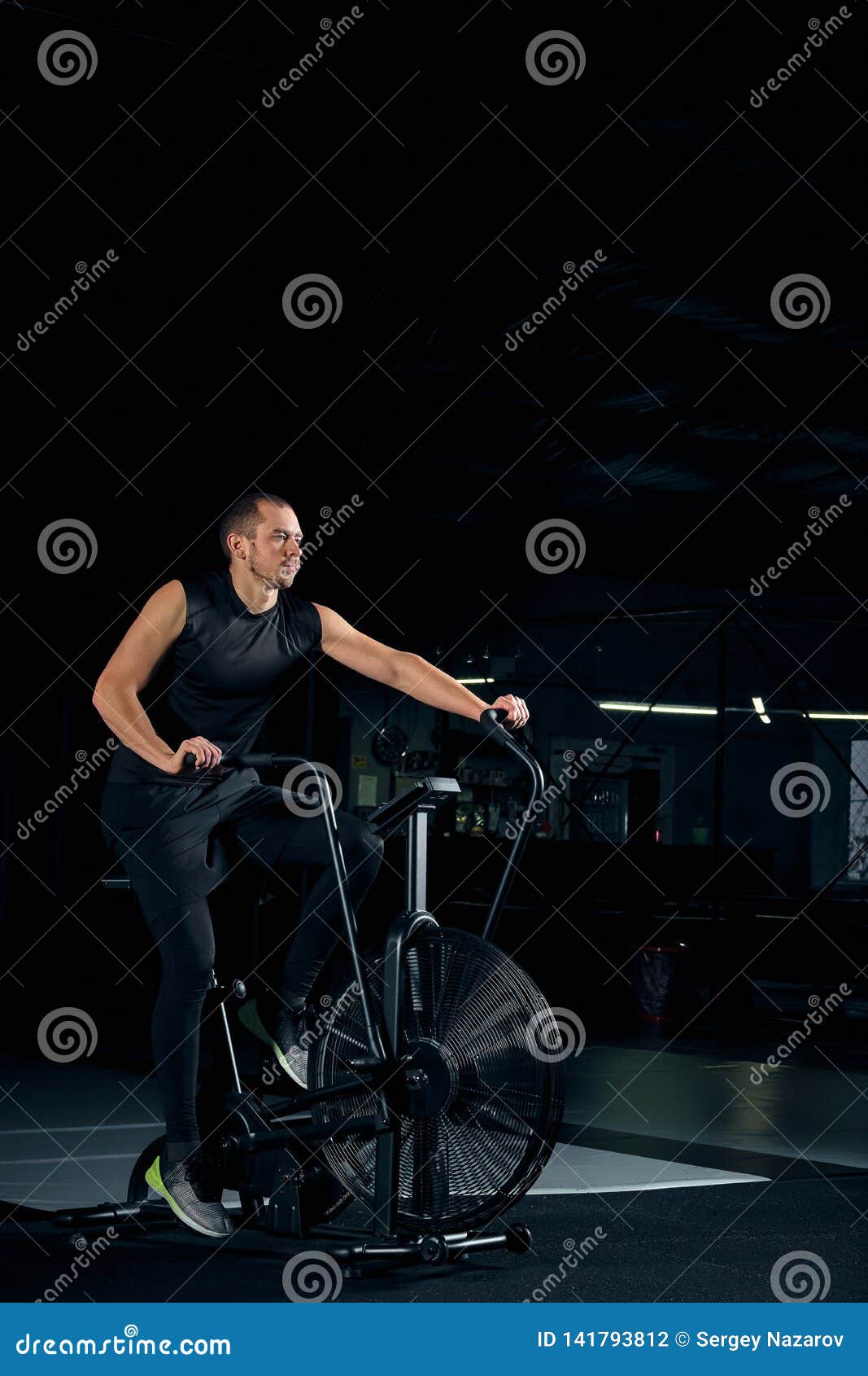 Male Using Air Bike For Cardio Workout At Cross Training ...