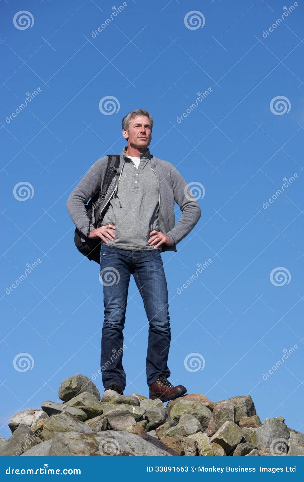 Male Walker Standing on Pile of Rocks Stock Image Image of escape