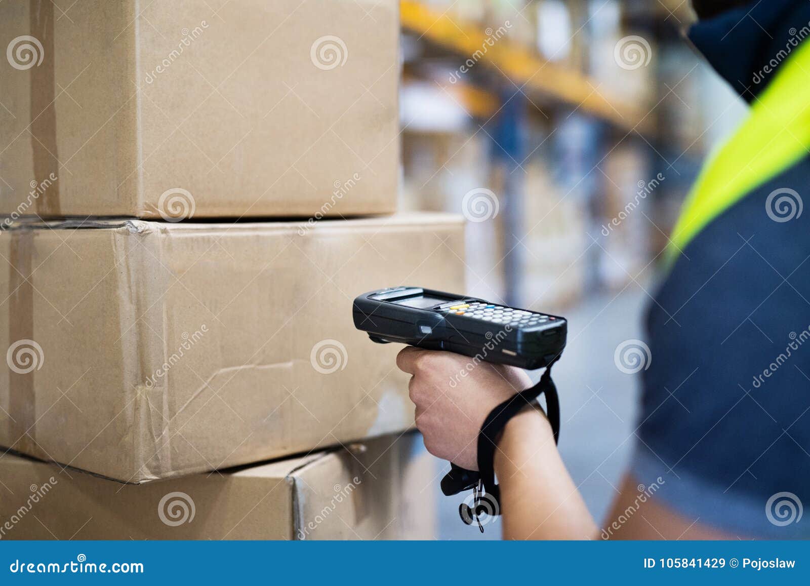 male warehouse worker with barcode scanner.