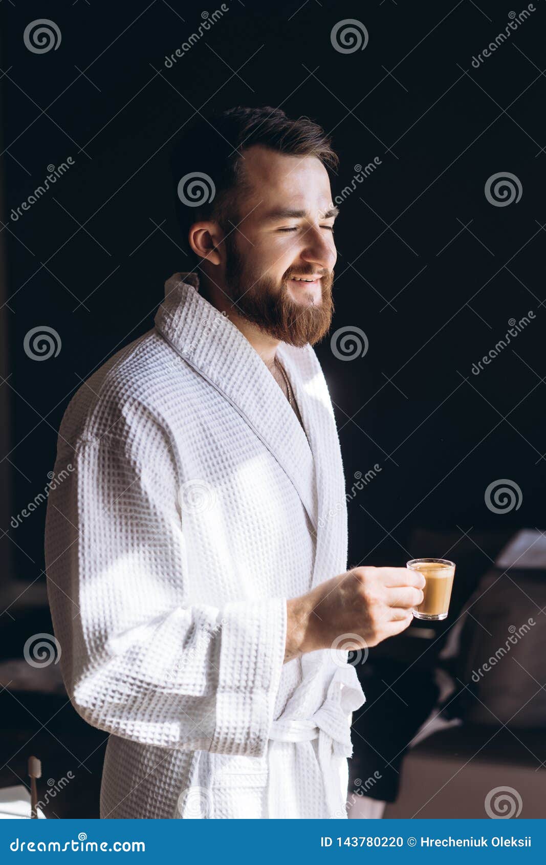 Male in White Bathrobe with Coffee Mug in Hand. Stock Photo Image of cute, hotel 143780220