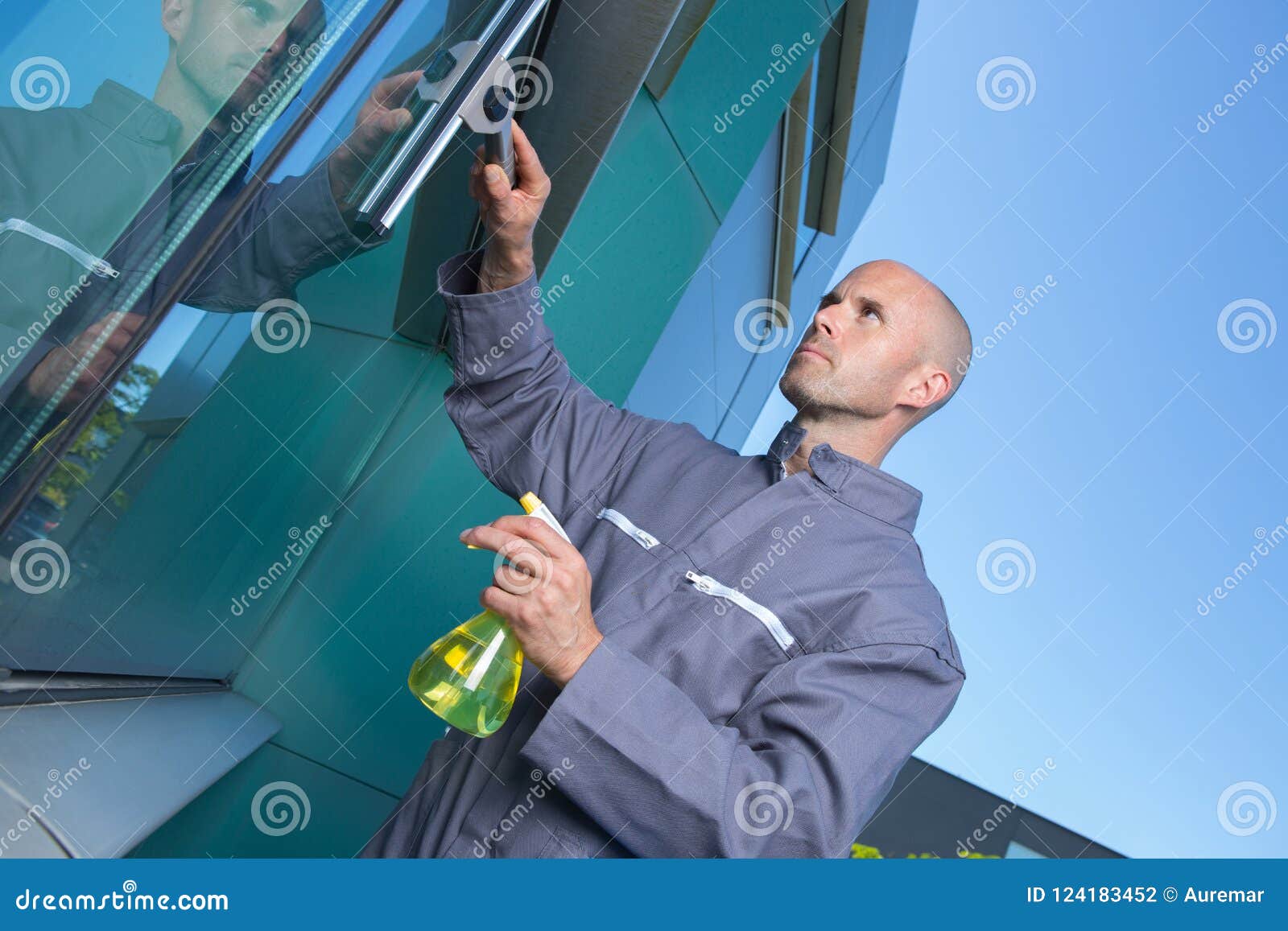 Male Worker Cleaning Glass with Rag Stock Photo Image of service
