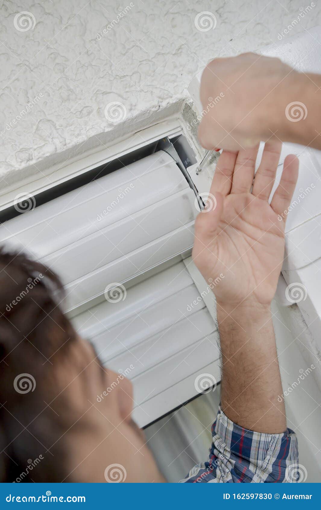 Male Worker Fixing Rolling Blinds Stock Photo Image of building