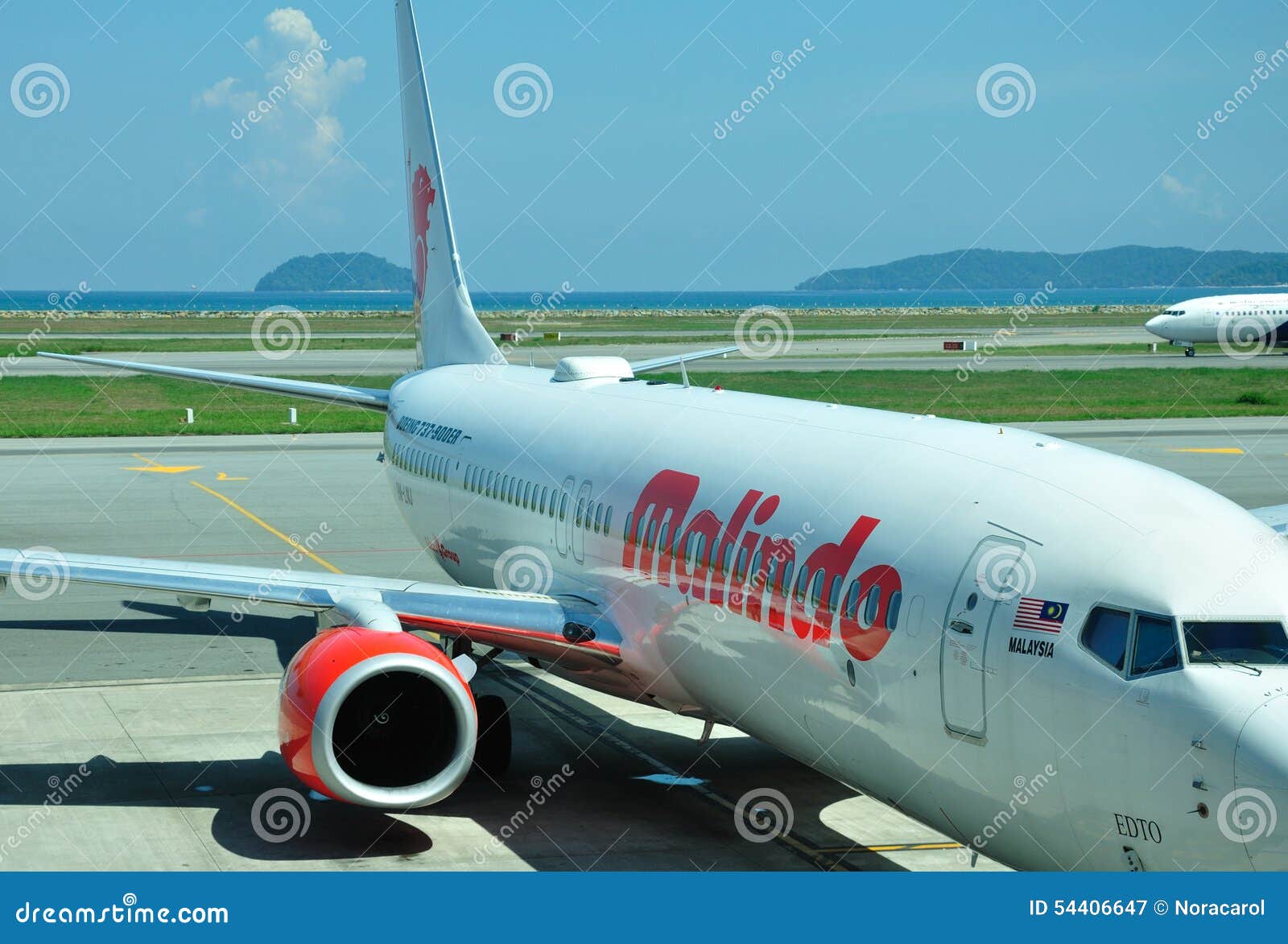 Malindo Air Airline Logo On The Mobile Phone Screen With A Plane ...