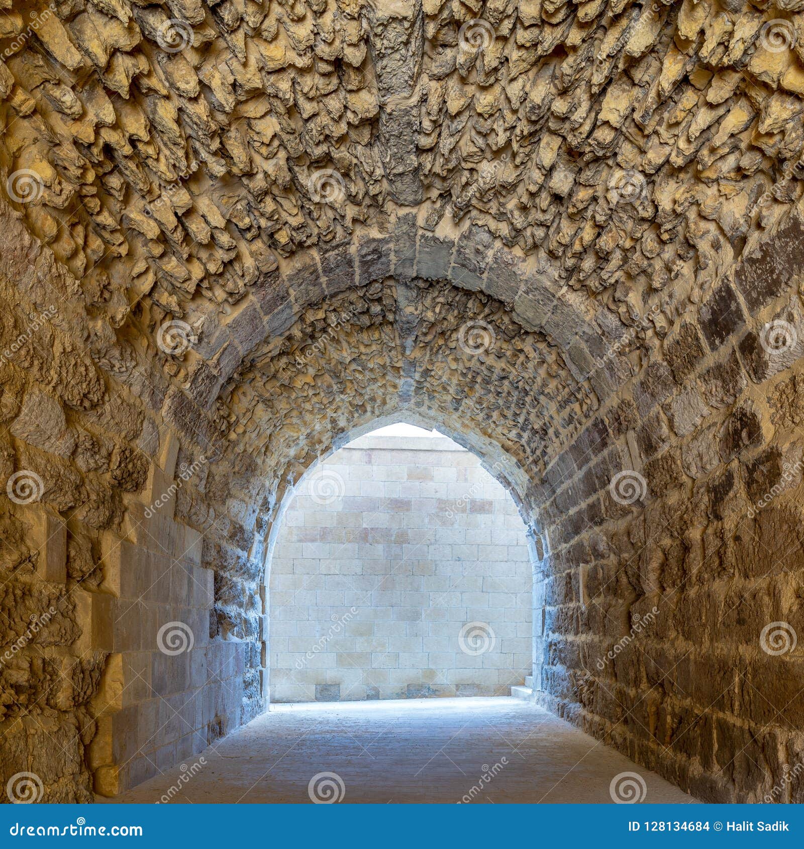 mamluk era arched stones tunnel leading to al-muayyad bimaristan ancient hospital, cairo, egypt