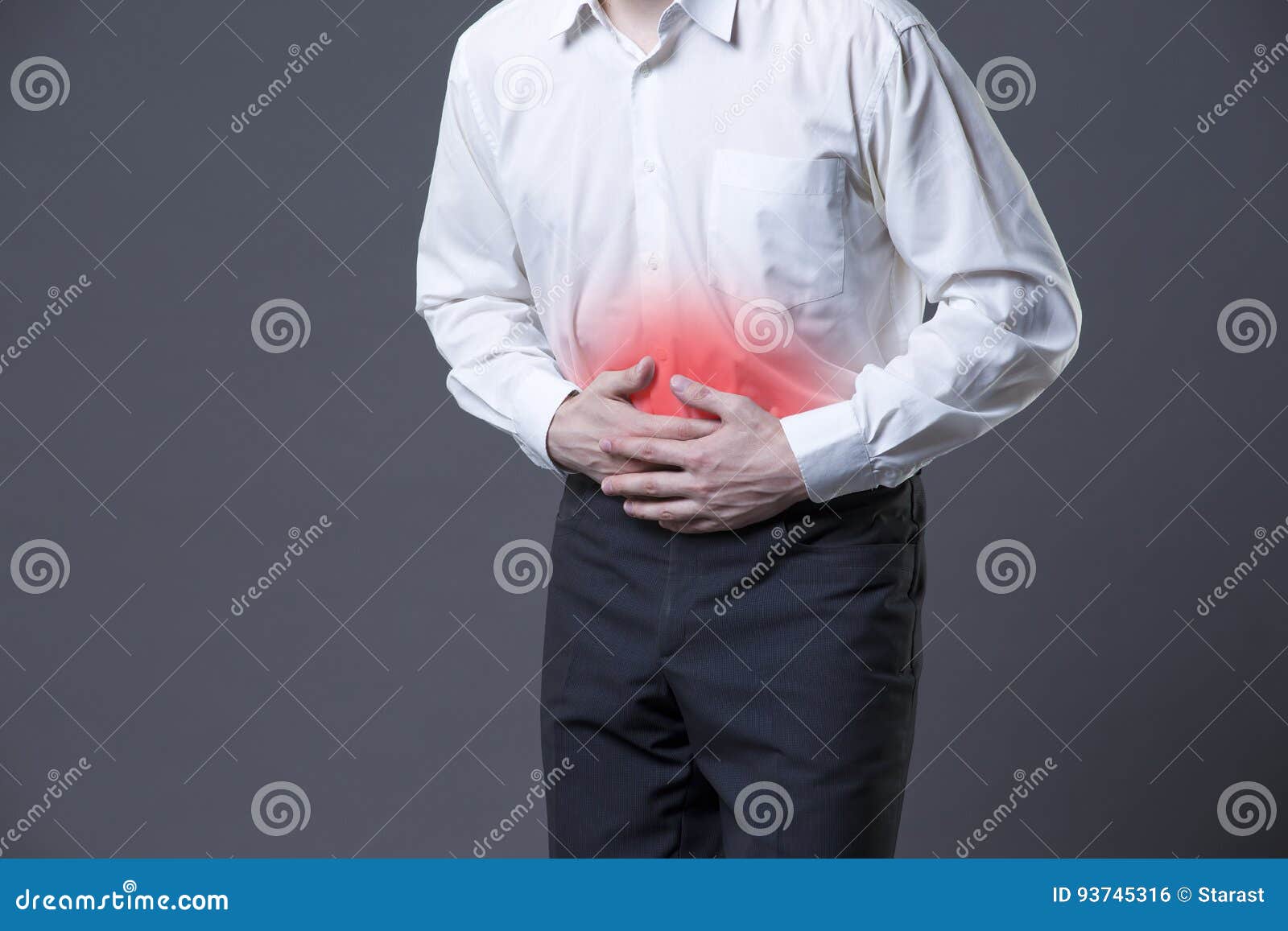 man with abdominal pain, stomach ache on gray background
