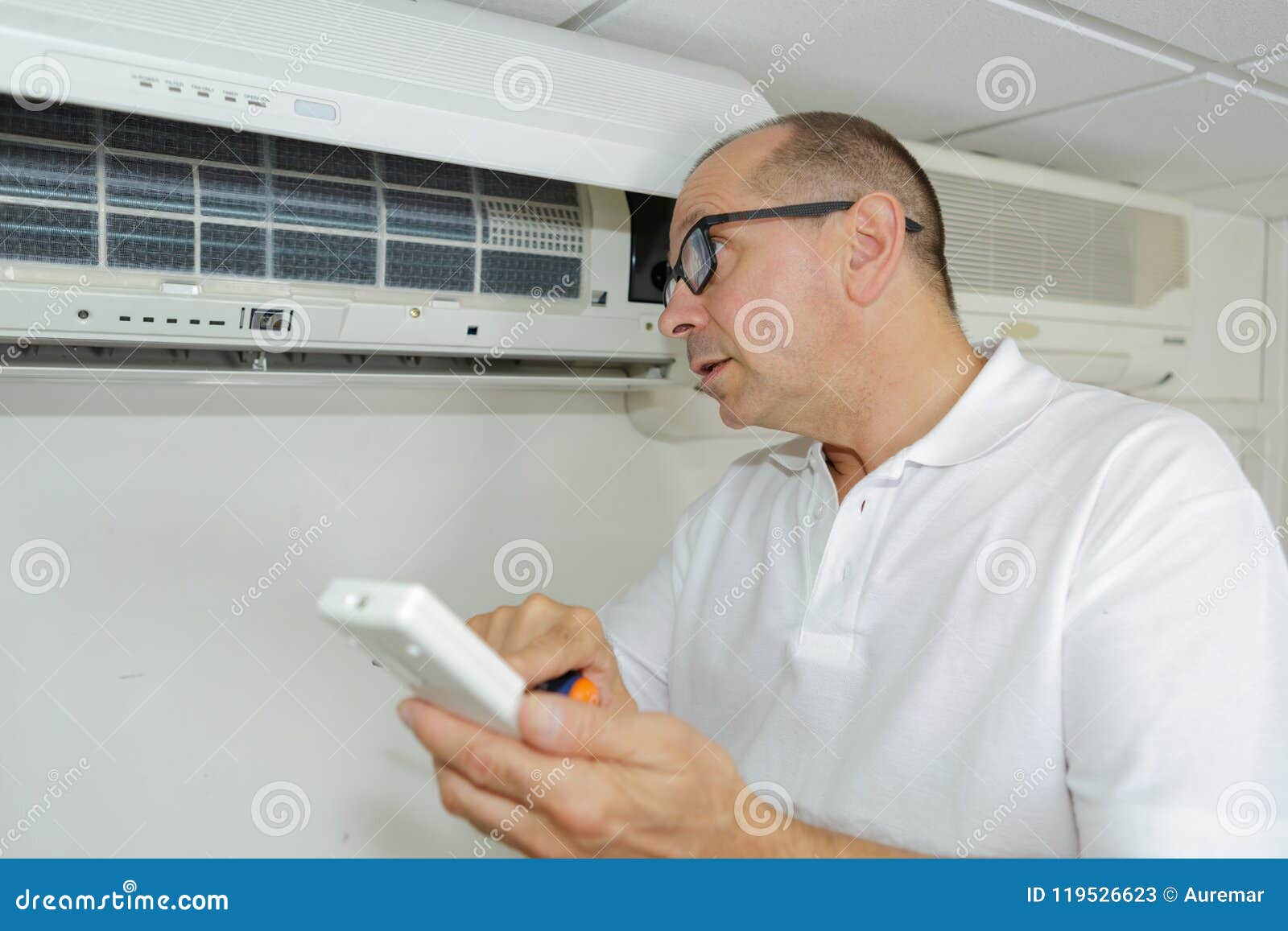 Man Adjusting Air Conditioning System Stock Image Image of