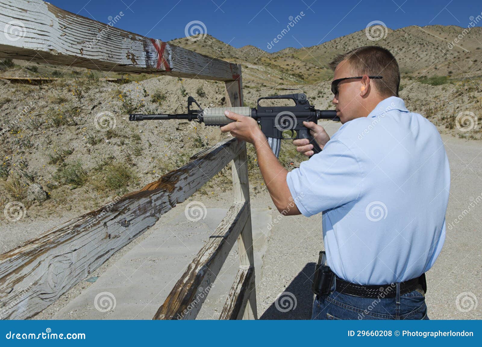 Man Aiming Rifle at Firing Range Stock Photo Image of profile