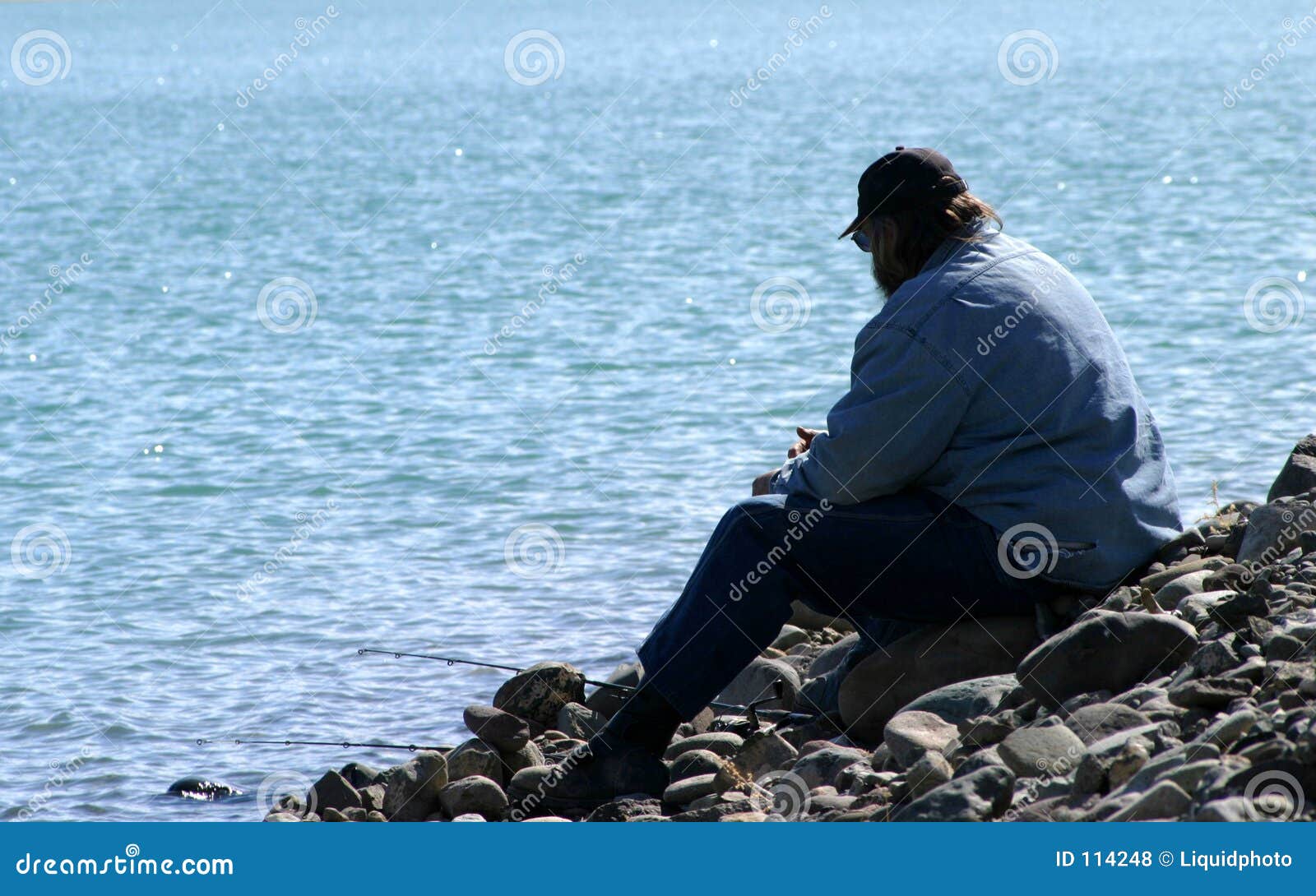 Man Alone at the Lake stock photo. Image of fishing, male 114248